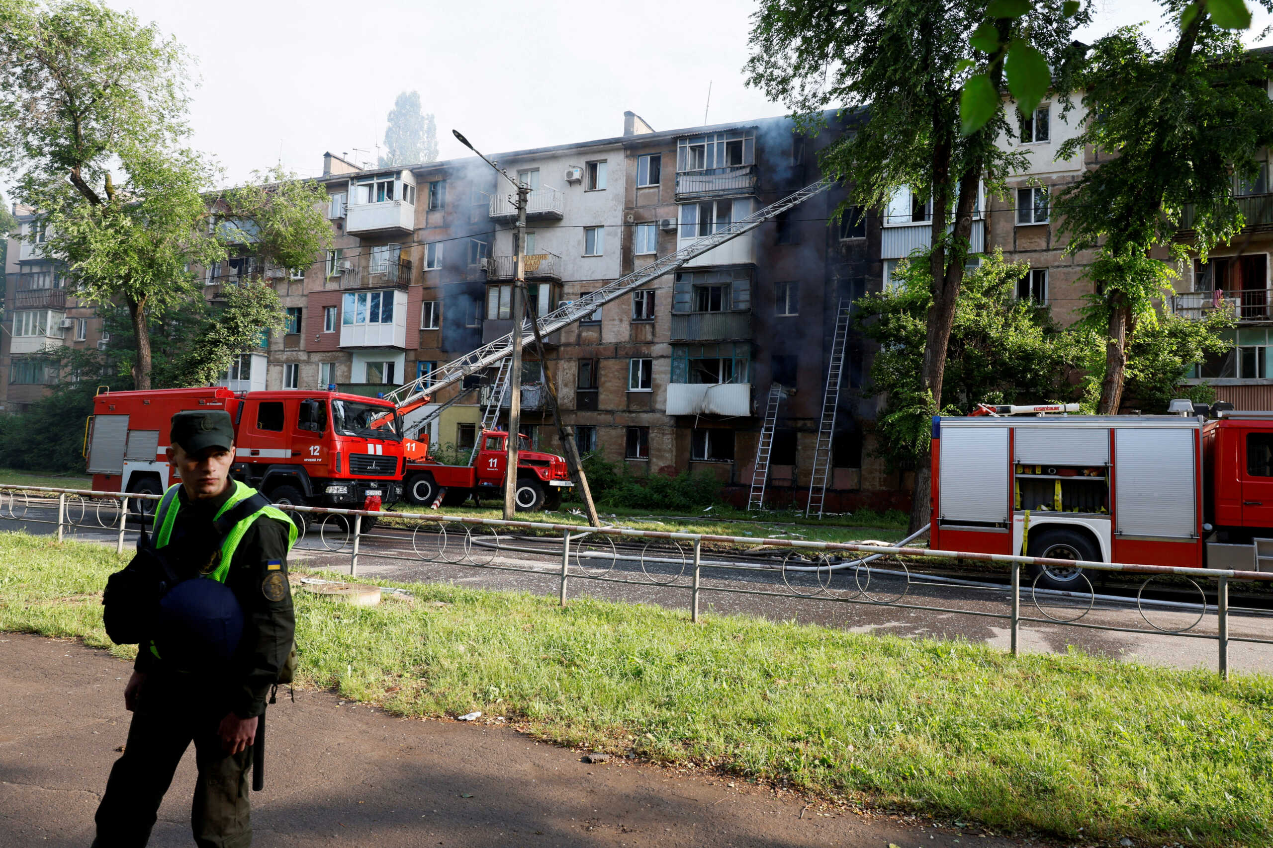 Rescuers work at a site of a residential building heavily damaged by a Russian missile strike, amid Russia's attack on Ukraine, in Kryvyi Rih, Dnipropetrovsk region, Ukraine June 13, 2023. REUTERS