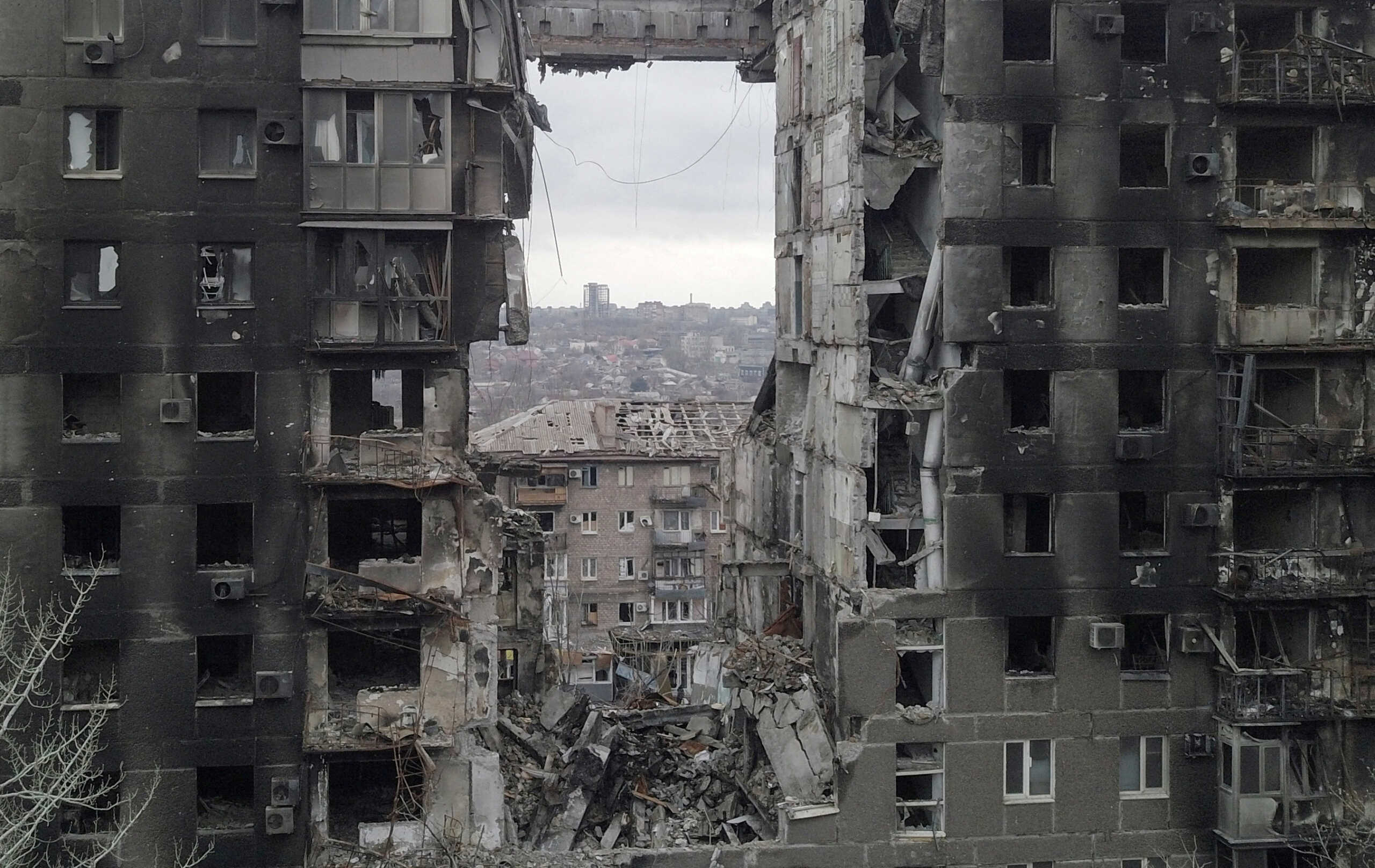 FILE PHOTO: A view shows a residential building destroyed in the course of Ukraine-Russia conflict in the southern port city of Mariupol, Ukraine April 14, 2022. Picture taken with a drone. REUTERS