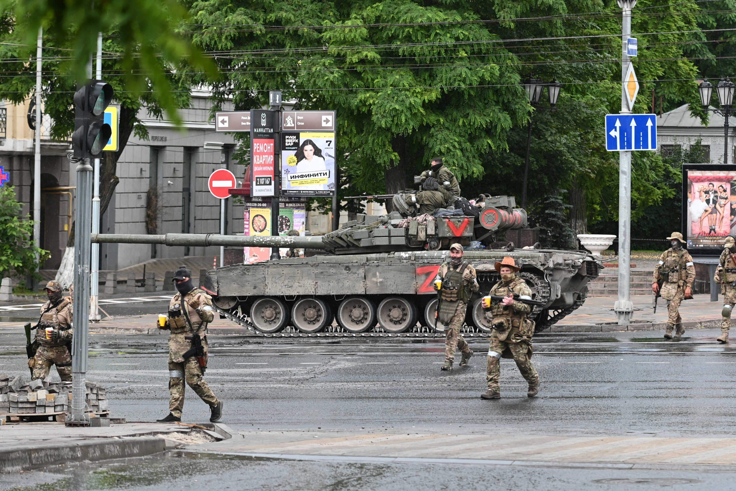 Fighters of Wagner private mercenary group cross a street as they get deployed near the headquarters of the Southern Military District in the city of Rostov-on-Don, Russia, June 24, 2023. REUTERS