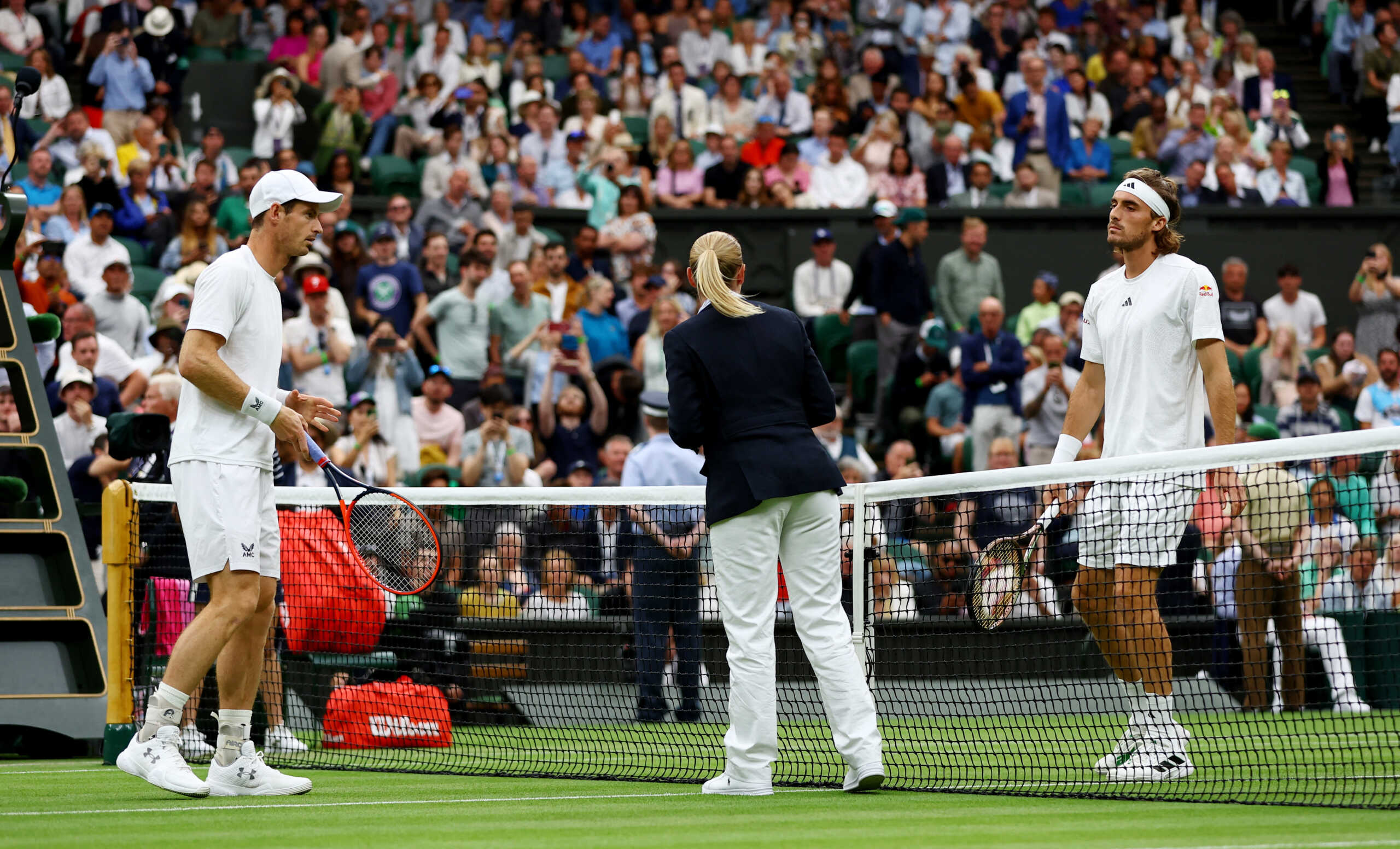 Tennis - Wimbledon - All England Lawn Tennis and Croquet Club, London, Britain - July 6, 2023 Britain’s Andy Murray and Greece's Stefanos Tsitsipas before their second round match REUTERS