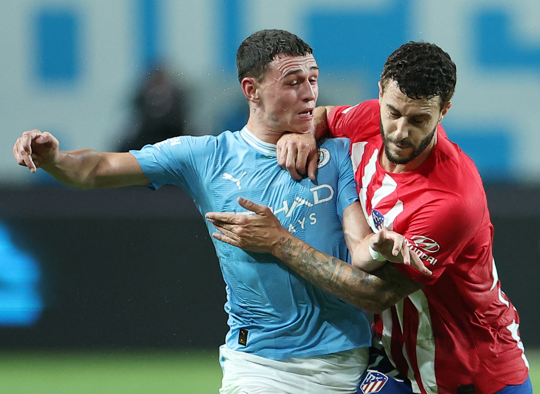 Soccer Football - Pre-Season Friendly - Atletico Madrid v Manchester City - Seoul World Cup Stadium, Seoul, South Korea - July 30, 2023 Manchester City's Phil Foden in action with Atletico Madrid's Mario Hermoso REUTERS