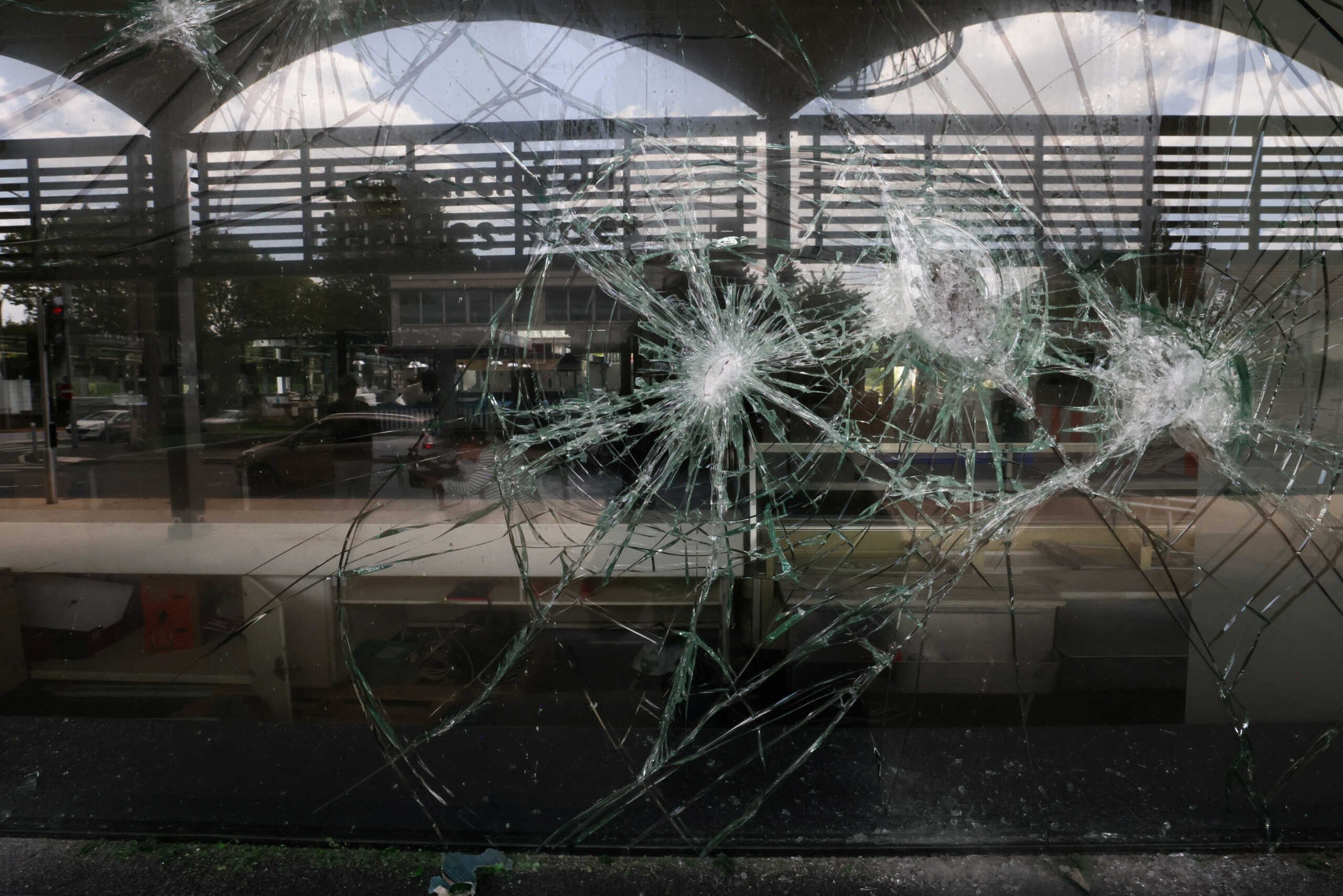 A view of the damaged glass window of the indoor market, following the death of Nahel, a 17-year-old teenager killed by a French police officer in Nanterre during a traffic stop, in L'Hay-les-Roses near Paris, France July 2, 2023. REUTERS