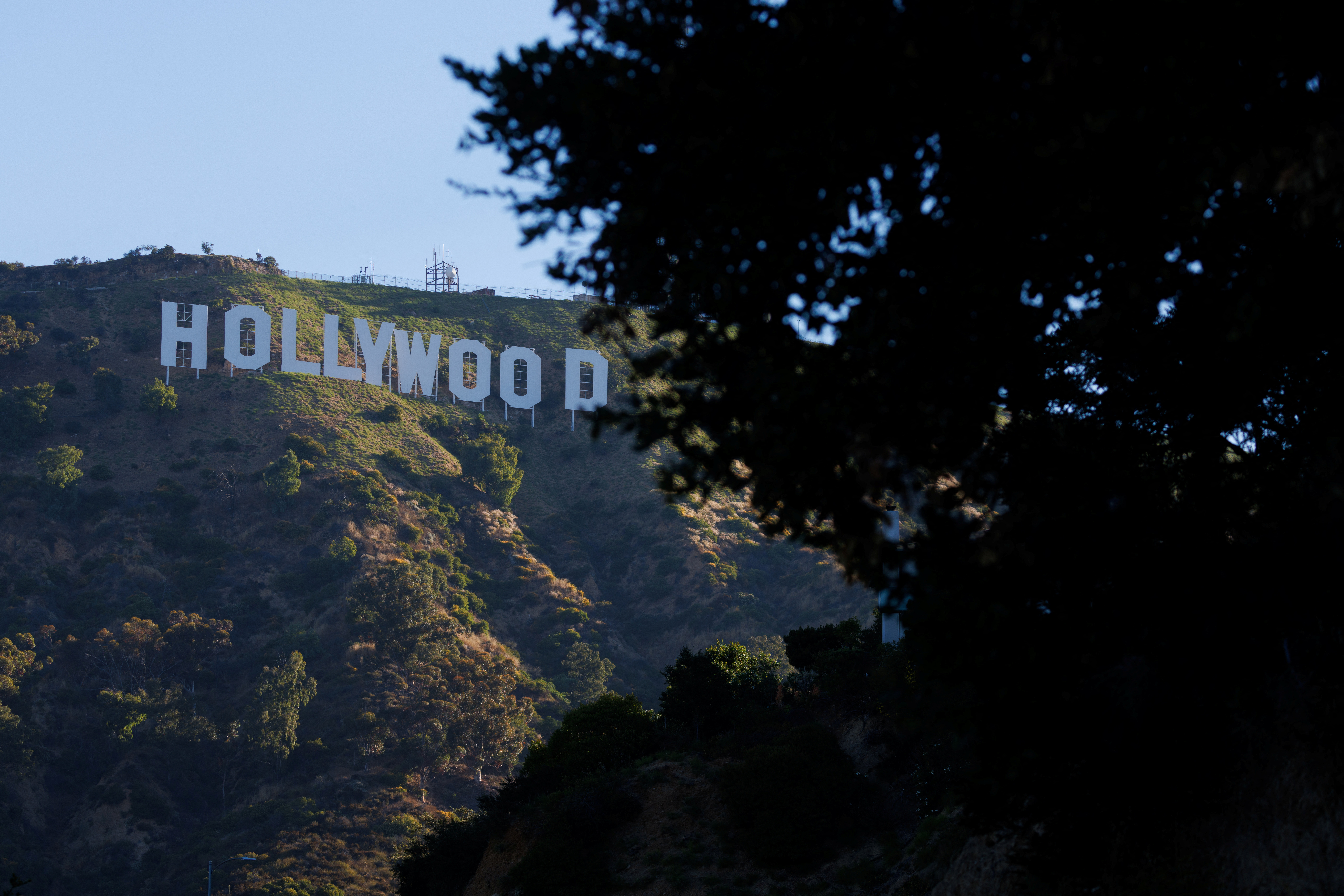 The iconic Hollywood sign is shown in early morning light after the SAG-AFTRA union failed to come to a labor agreement with Hollywood studios in Los Angeles, California, U.S., July 13, 2023.   REUTERS