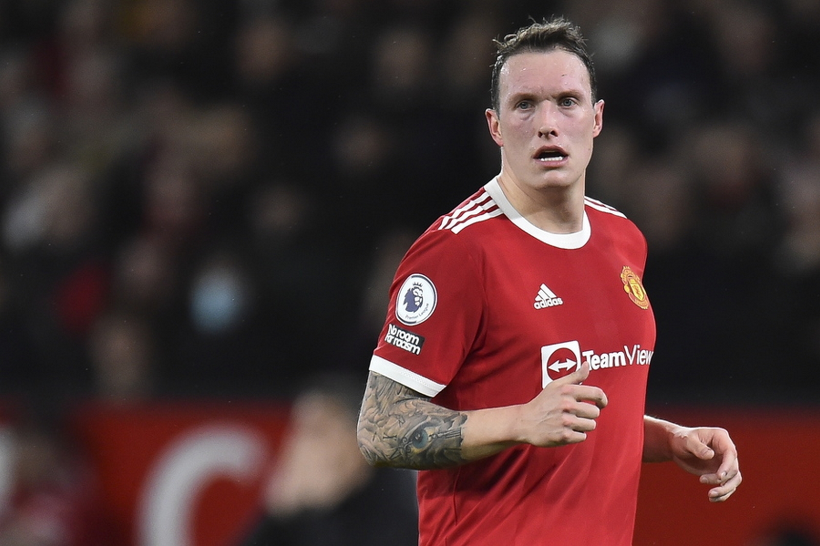 epa09664957 Manchester United's Phil Jones reacts during the English Premier League match between Manchester United and Wolverhampton Wanderers in Manchester, Britain, 03 January 2022.  EPA