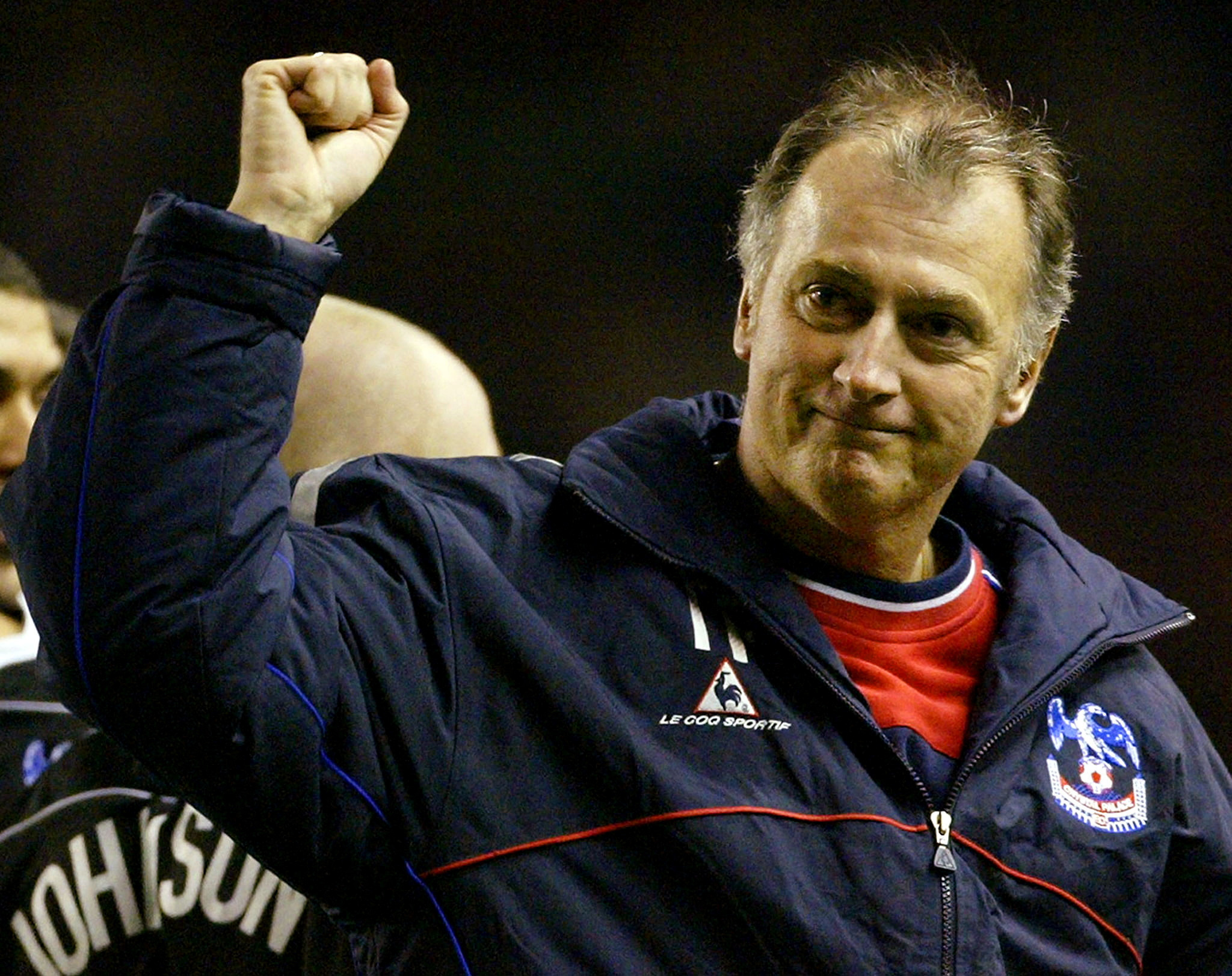 FILE PHOTO: Crystal Palace Manager Trevor Francis Salutes The Crowd After Beating Liverpool In Fa Cup Fourth Round Replay At Anfield. REUTERS