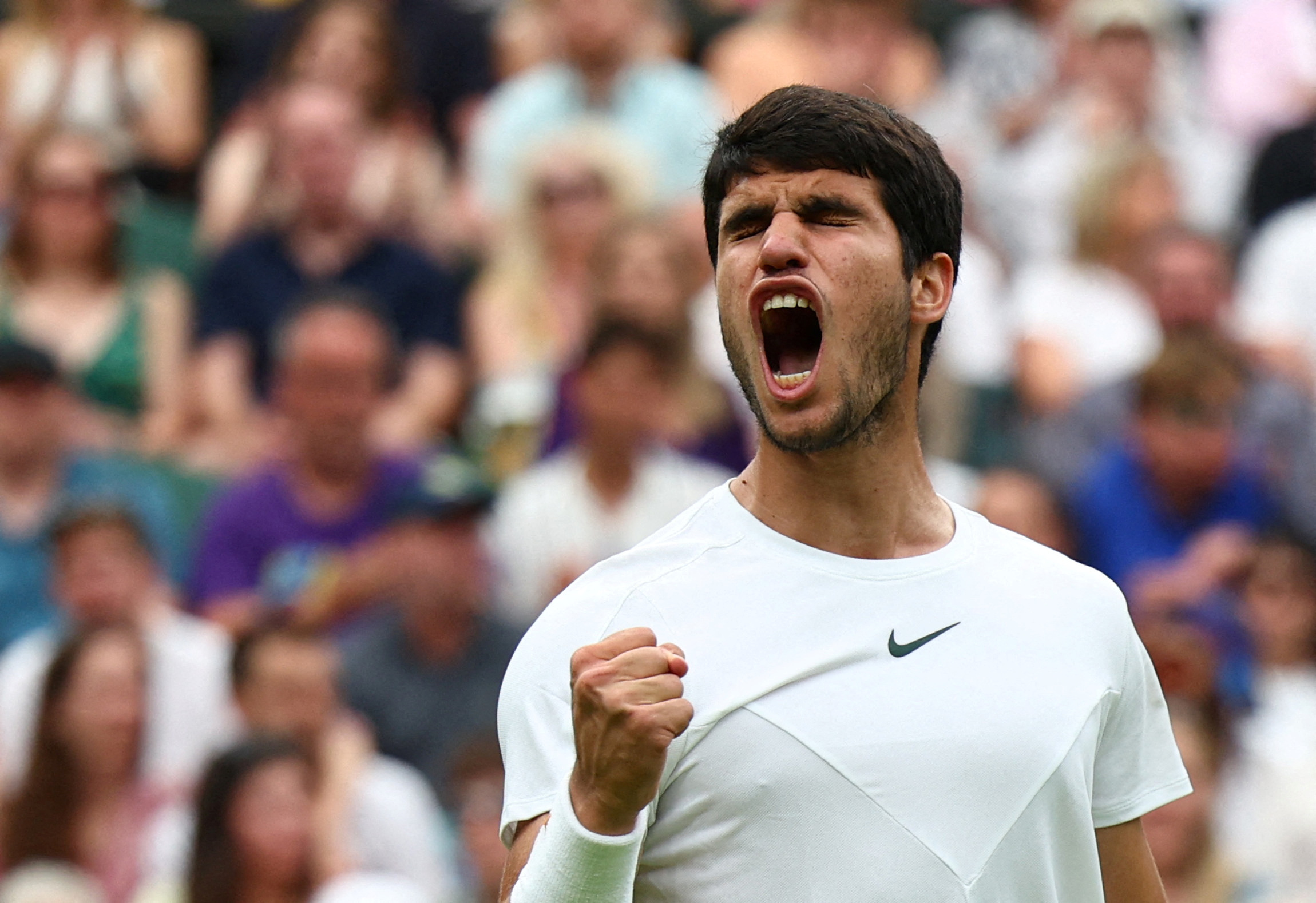 Tennis - Wimbledon - All England Lawn Tennis and Croquet Club, London, Britain - July 8, 2023 Spain's Carlos Alcaraz reacts during his third round match against Chile's Nicolas Jarry REUTERS