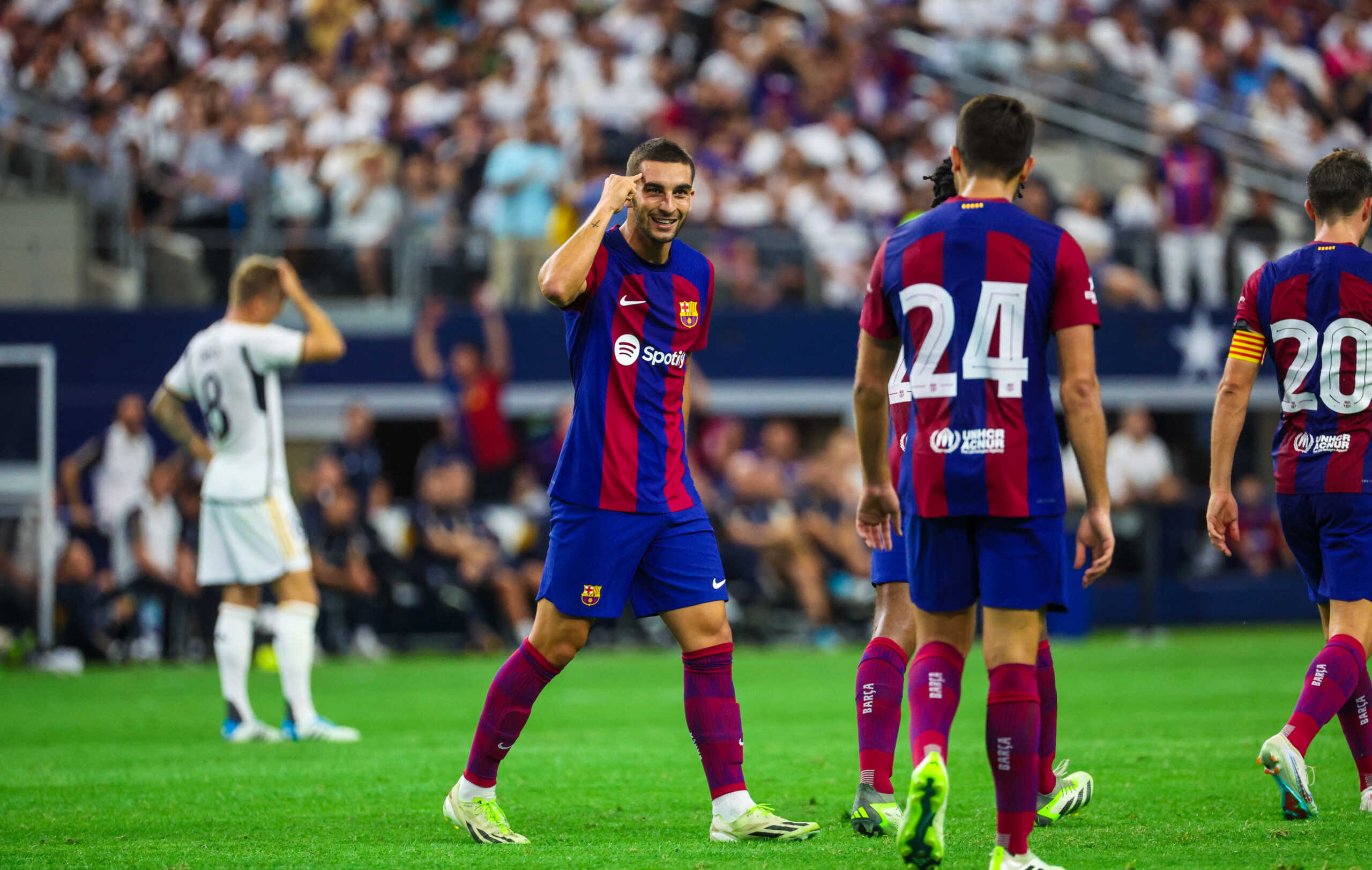 Jul 29, 2023; Arlington, Texas, USA;  FC Barcelona forward Ferran Torres (11) celebrates with teammates after scoring a goal during the second half against Real Madrid at AT&T Stadium. Mandatory Credit: Kevin Jairaj-USA TODAY Sports