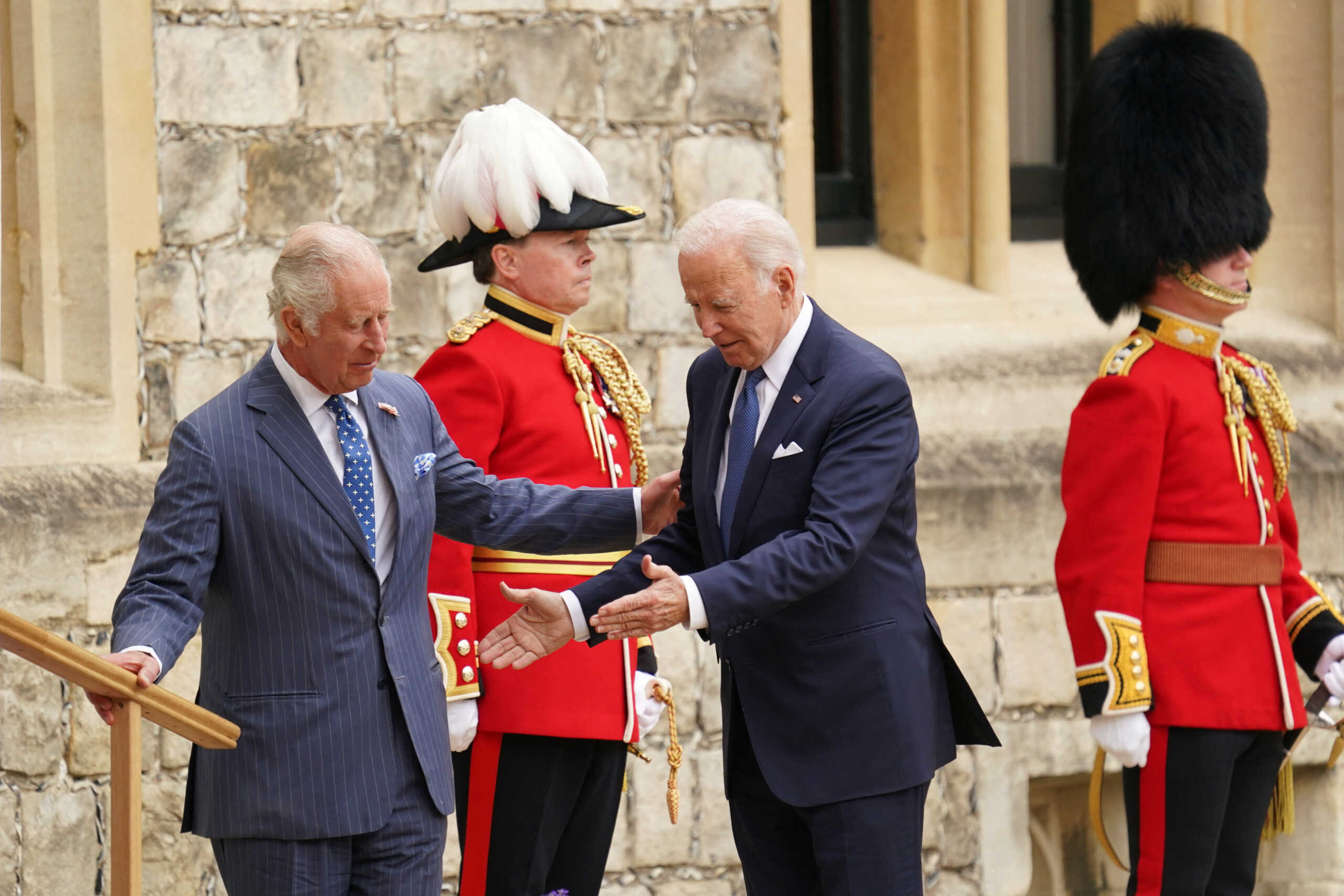 U.S. President Joe Biden is welcomed by Britain's King Charles at Windsor Castle in Windsor, Britain, July 10, 2023. REUTERS