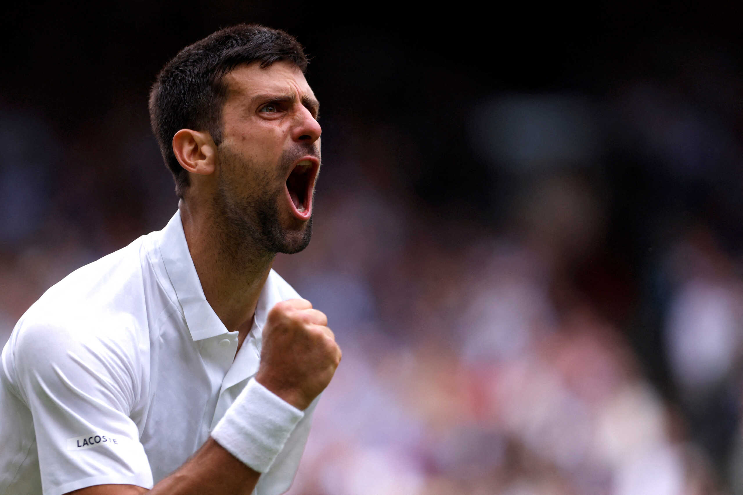 Tennis - Wimbledon - All England Lawn Tennis and Croquet Club, London, Britain - July 11, 2023 Serbia's Novak Djokovic celebrates winning the third set during his quarter final match against Russia's Andrey Rublev REUTERS