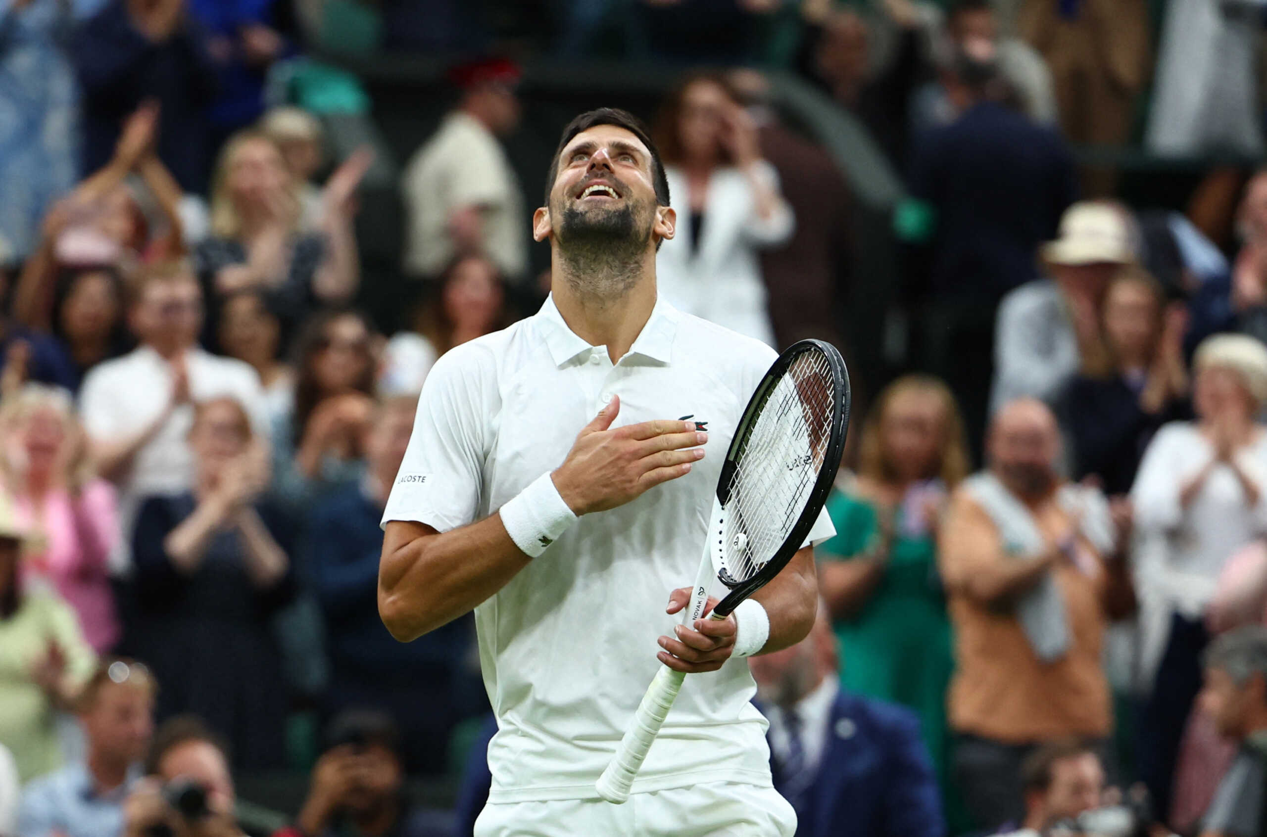 Tennis - Wimbledon - All England Lawn Tennis and Croquet Club, London, Britain - July 14, 2023 Serbia's Novak Djokovic celebrates winning his semi final match against Italy's Jannik Sinner REUTERS
