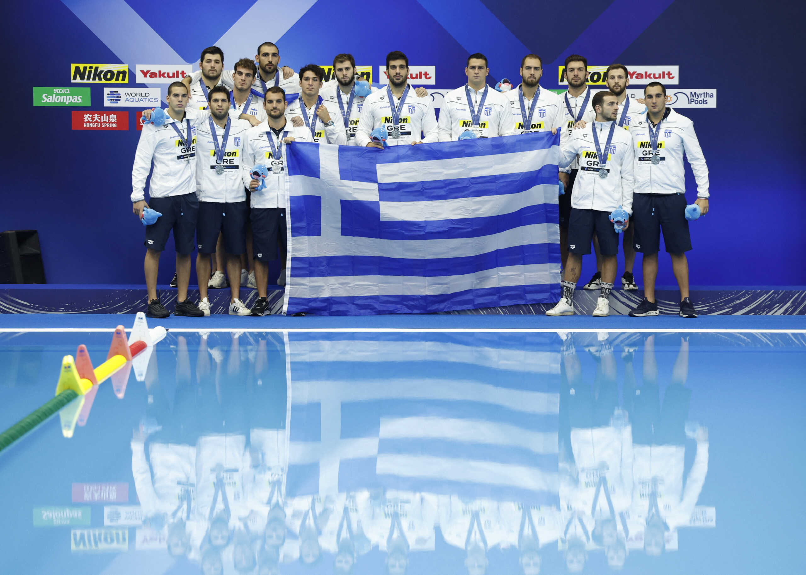 Fukuoka 2023 World Aquatics Championships - Water Polo - Men's Gold Medal Match - Greece v Hungary - Marine Messe Fukuoka Hall B, Fukuoka, Japan - July 29, 2023 Greece players celebrate on the podium after winning silver REUTERS