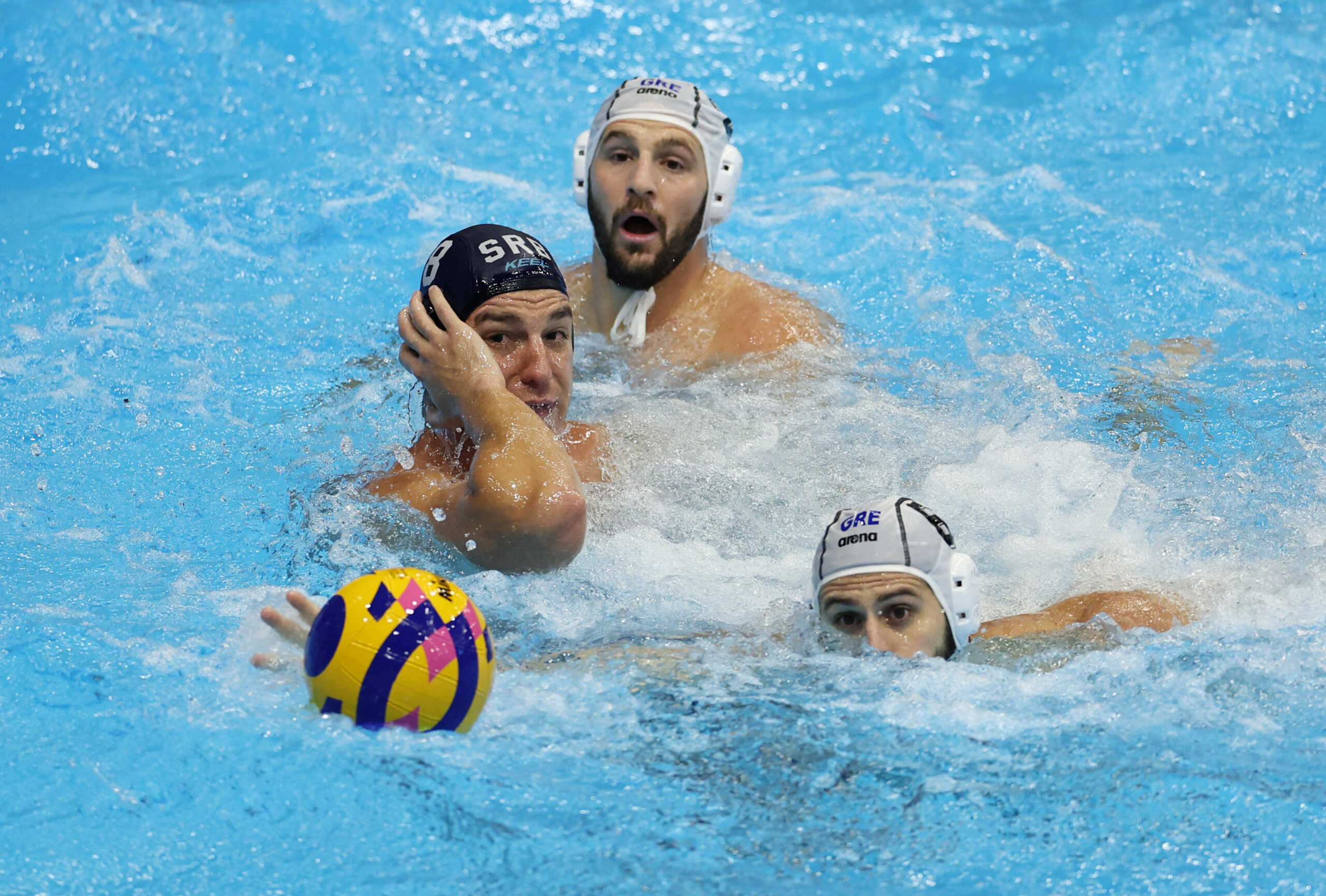 Fukuoka 2023 World Aquatics Championships - Water Polo - Men's Semi Final - Greece v Serbia - Marine Messe Fukuoka Hall B, Fukuoka, Japan - July 27, 2023  Greece's Alexandros Papanastasiou in action with Serbia's Nikola Jaksic REUTERS