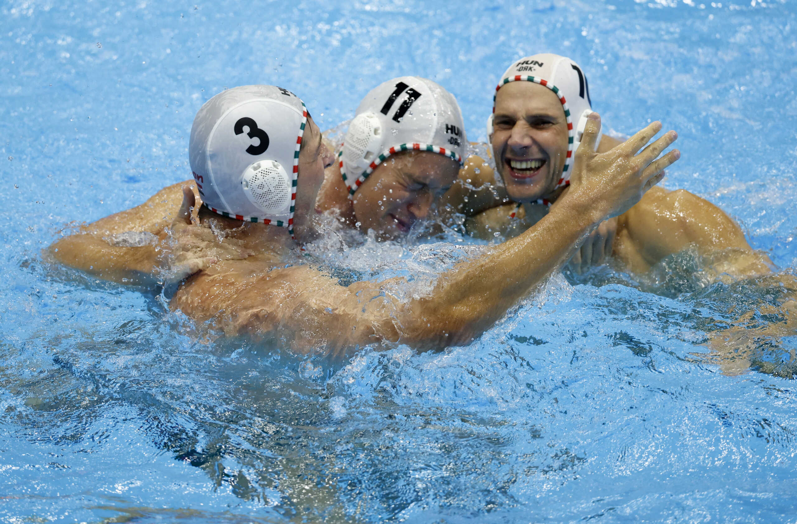 Fukuoka 2023 World Aquatics Championships - Water Polo - Men's Semi Final - Hungary v Spain - Marine Messe Fukuoka Hall B, Fukuoka, Japan - July 27, 2023  Hungary's Krisztian Manhercz celebrates with Szilard Jansik after winning the match REUTERS