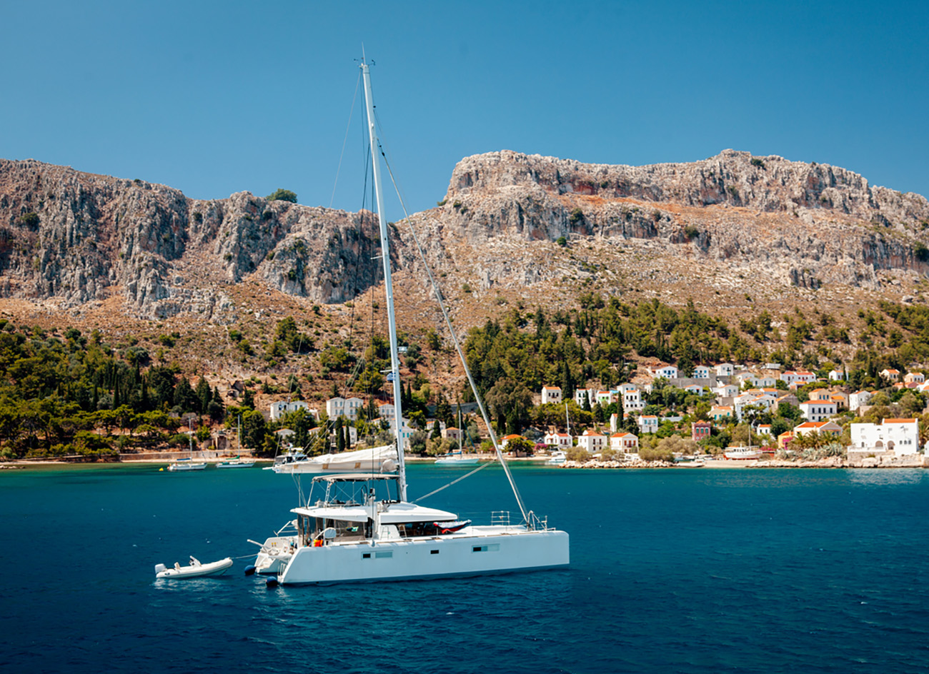 Sailboat anchored in bay at Kastellorizo Greece in summer time