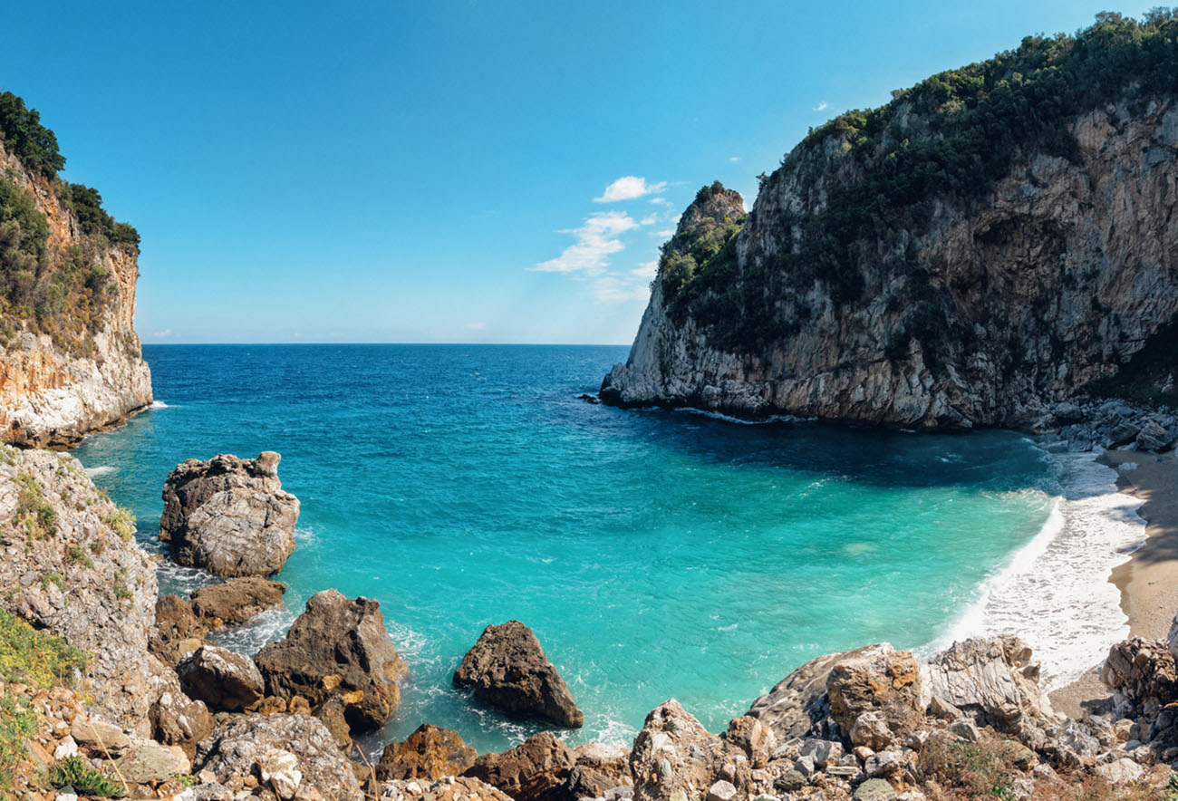 Aegean turquoise beach, rocky beach in the Mediterranean, Fakistra, Pelion Peninsula, Greece