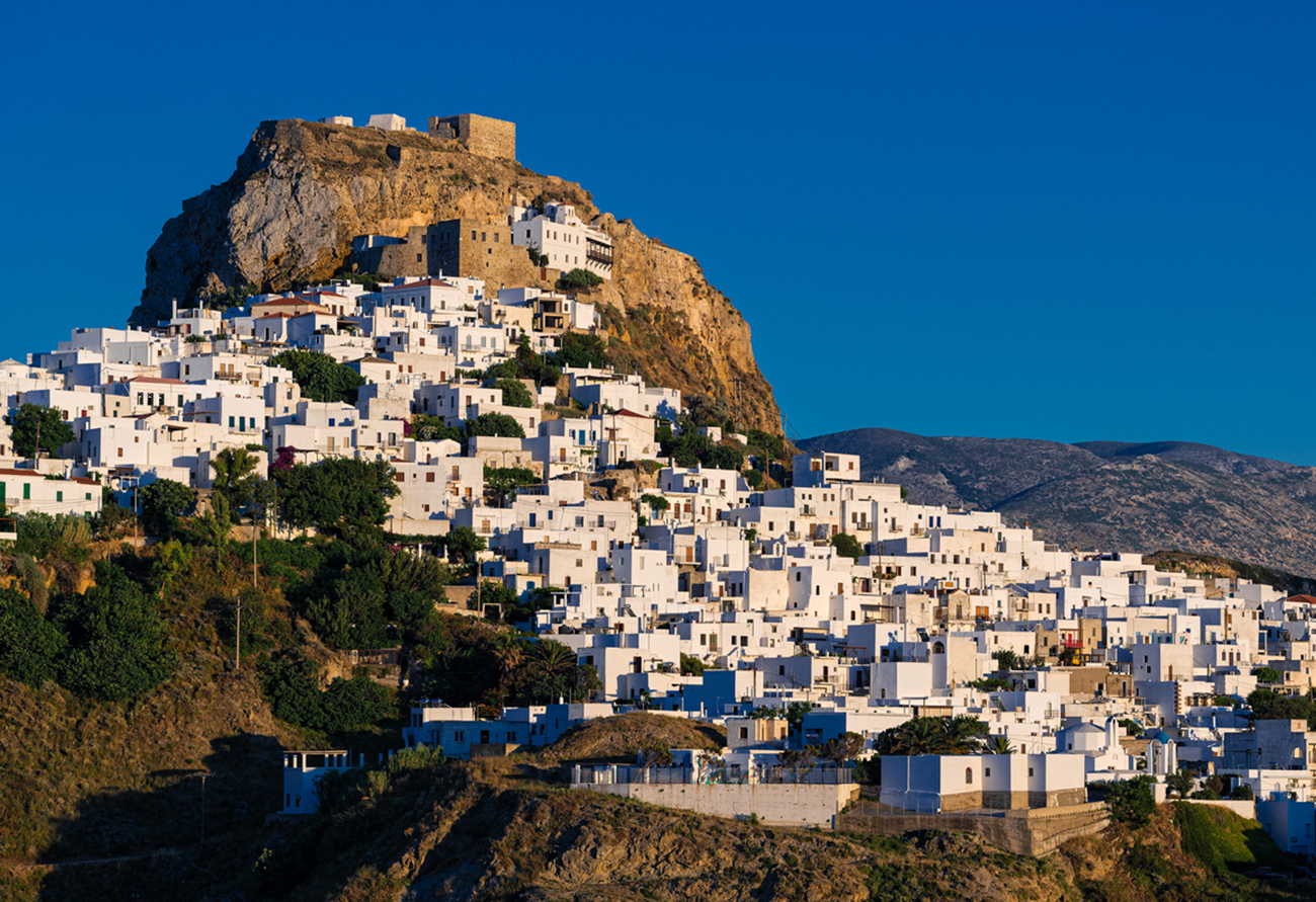Distant view of Skyros town or Chora, the capital of Skyros island in Greece at sunset