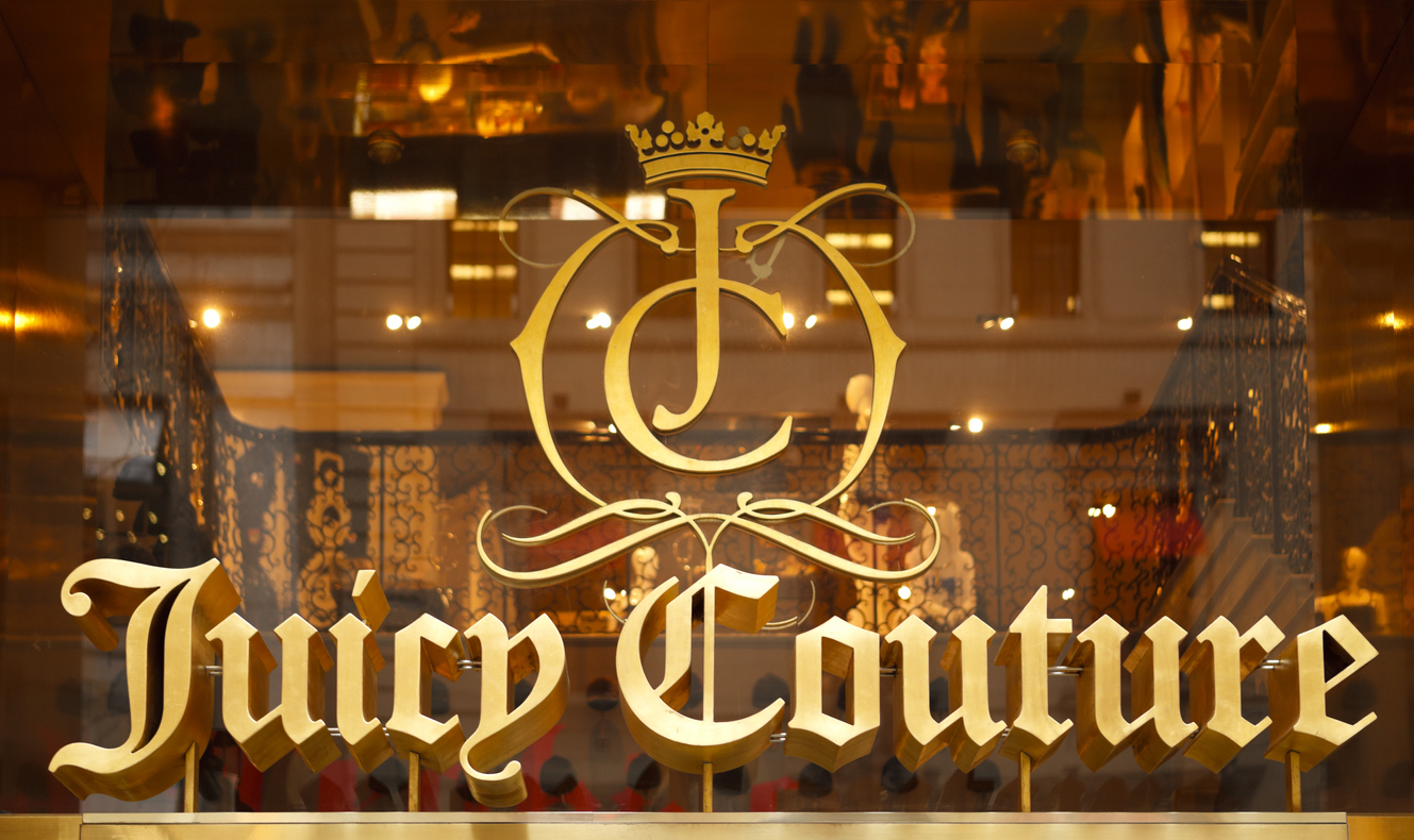 New York, New York, USA - March 14, 2011: The Juicy Couture logo display above the entrance to the Juicy Couture store on Fifth Avenue in New York City. Juicy Couture produces women's clothing, accessories, jewelry and fragrances.