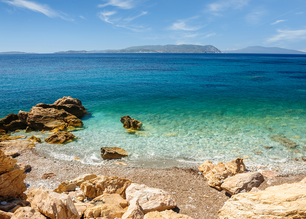 Loutraki beach on Greek island Skopelos in Aegean Sea, located at the end of Loutraki town, near abandoned dicotheque
