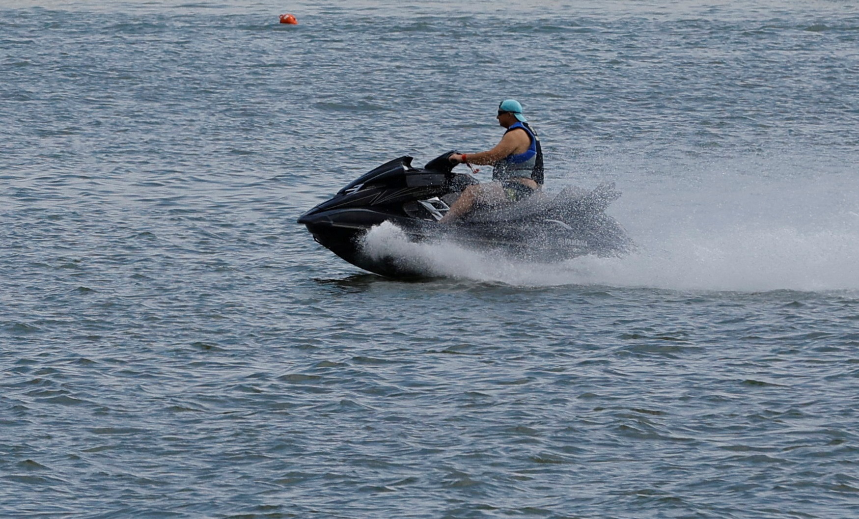 A man rides a jet ski on the Don River in Rostov-on-Don, Russia June 25, 2023. REUTERS