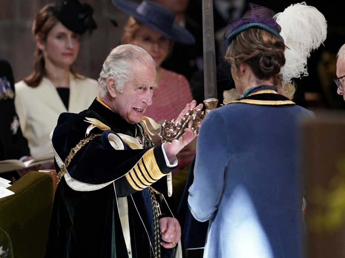 Britain's King Charles III is presented with the Elizabeth Sword by Dame Katherine Grainger during the National Service of Thanksgiving and Dedication for King Charles III and Queen Camilla, and the presentation of the Honours of Scotland, at St Giles' Cathedral, Edinburgh. Picture date: Wednesday July 5, 2023.     Andrew Milligan