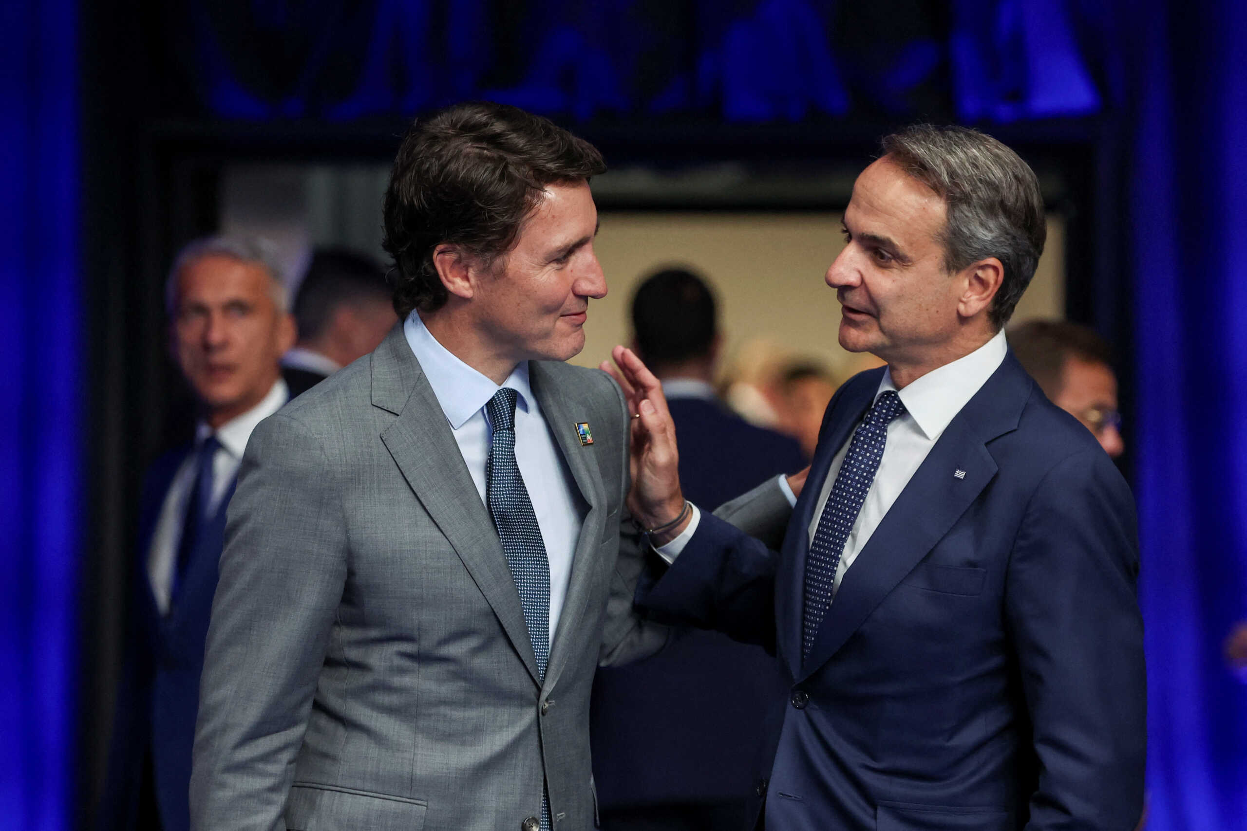 Canada's Prime Minister Justin Trudeau and Greek Prime Minister Kyriakos Mitsotakis attend a NATO leaders summit in Vilnius, Lithuania July 11, 2023. REUTERS