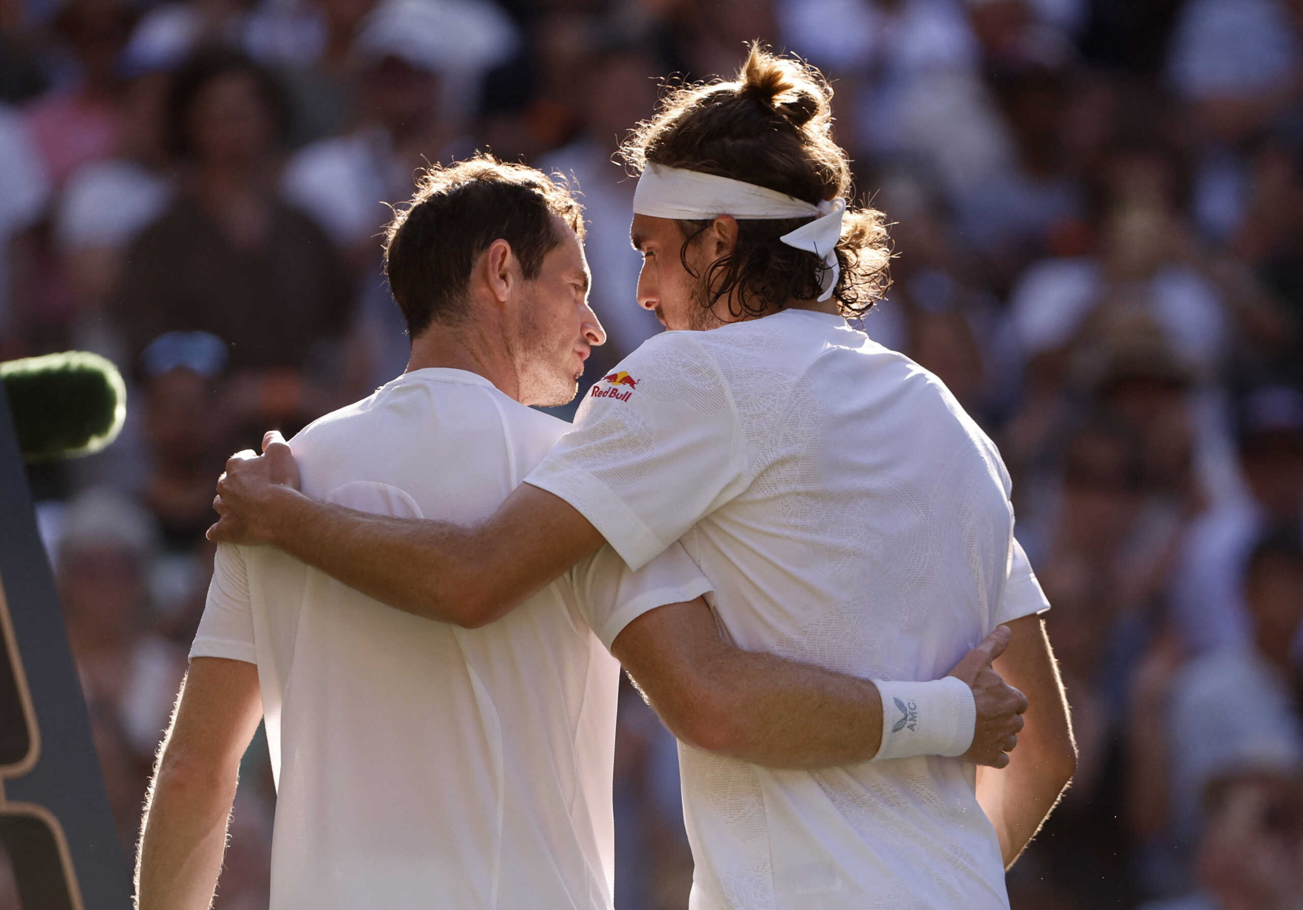 Tennis - Wimbledon - All England Lawn Tennis and Croquet Club, London, Britain - July 7, 2023 Greece’s Stefanos Tsitsipas with Britain’s Andy Murray after winning their second round match REUTERS