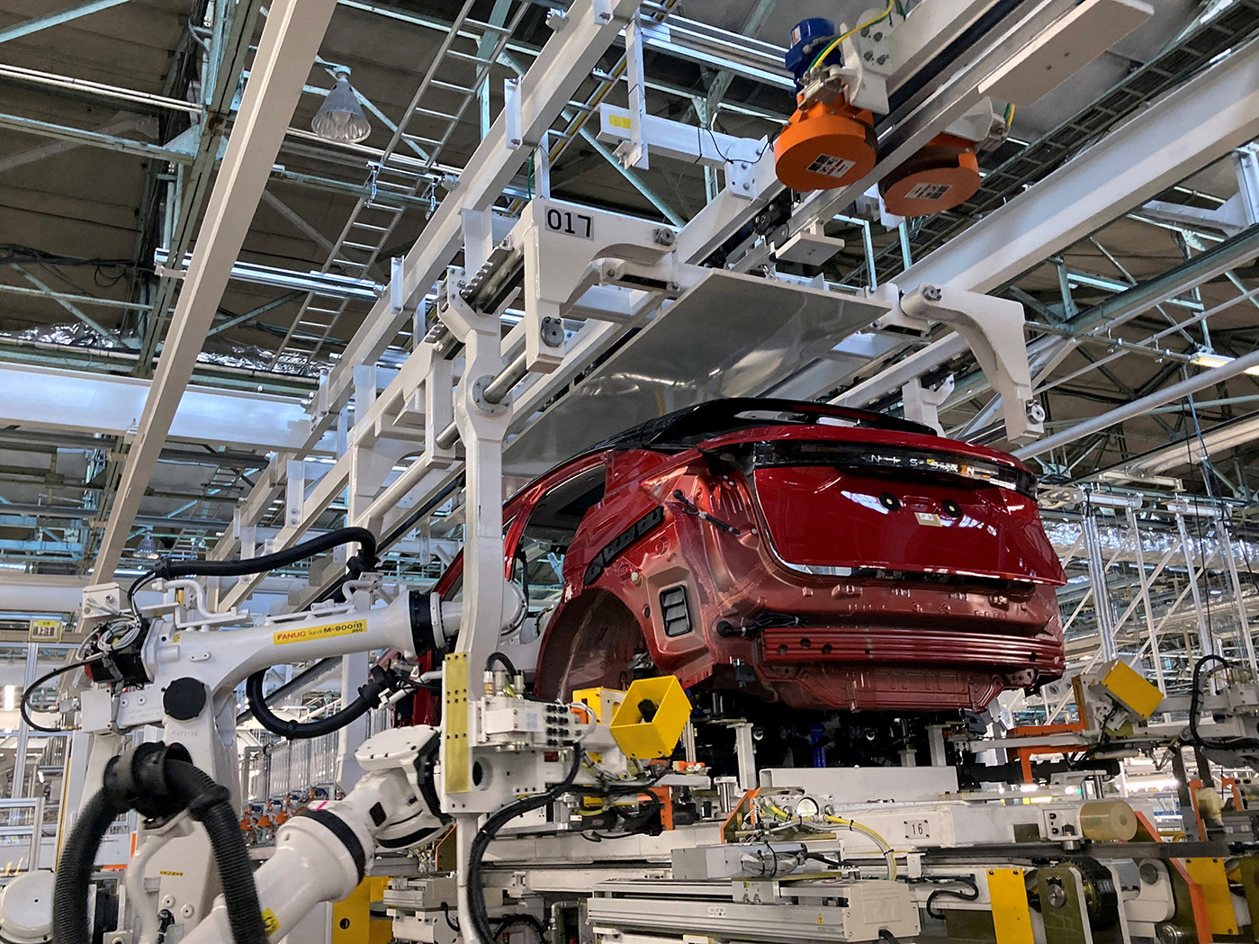 FILE PHOTO: Nissan Motor Co., Ltd's Universal Powertrain Mounting System with a two-layer pallet structure, compatible with EV, e-POWER (HV) and gasoline vehicles is pictured in Kawachi-gun, in Tochigi prefecture, Japan October 8, 2021. REUTERS