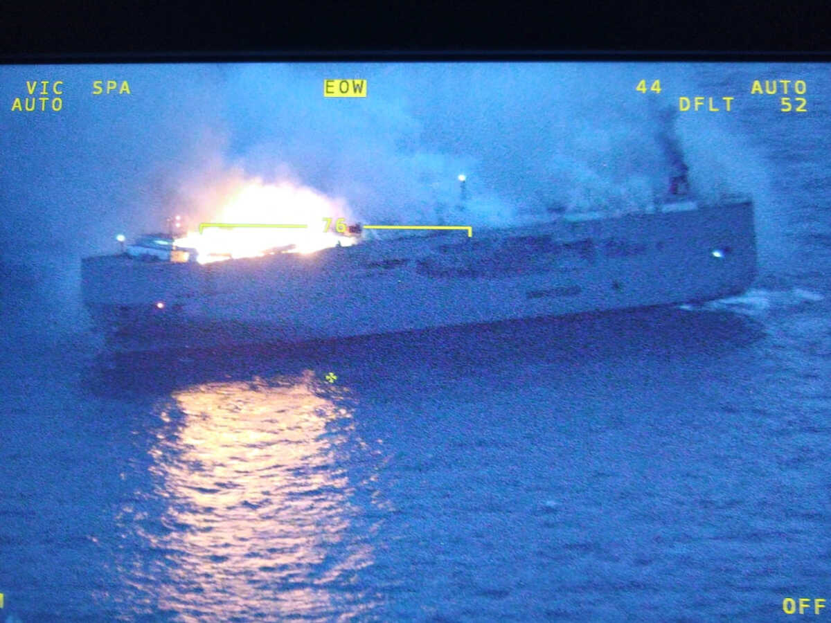Smoke rises as a fire broke out on the cargo ship Fremantle Highway, at sea on July 26, 2023. Coastguard Netherlands