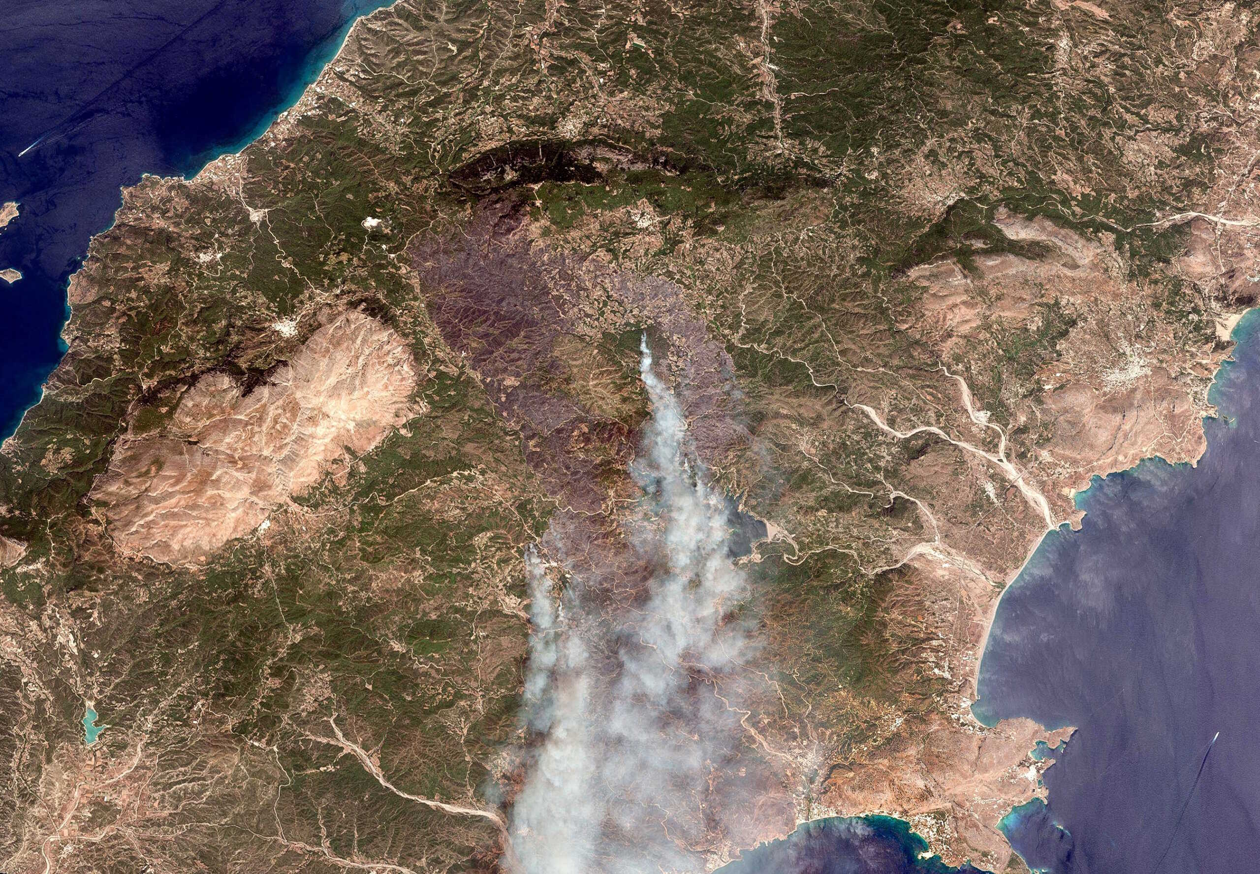 A satellite image showing overview of Rhodes wildfires, Greece, July 23, 2023. Maxar Technologies