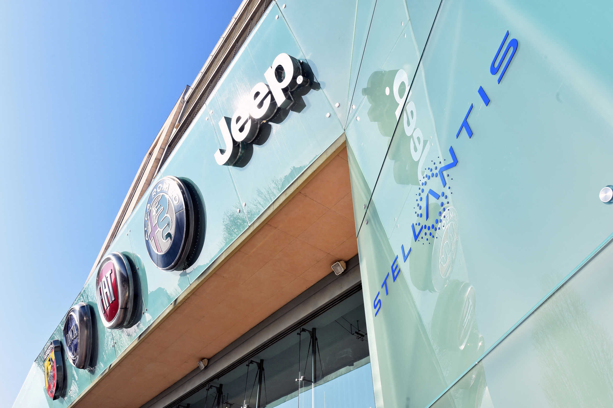 FILE PHOTO: The logo of Stellantis is seen at the main entrance of the FCA Mirafiori plant in Turin, Italy, January 18, 2021. REUTERS
