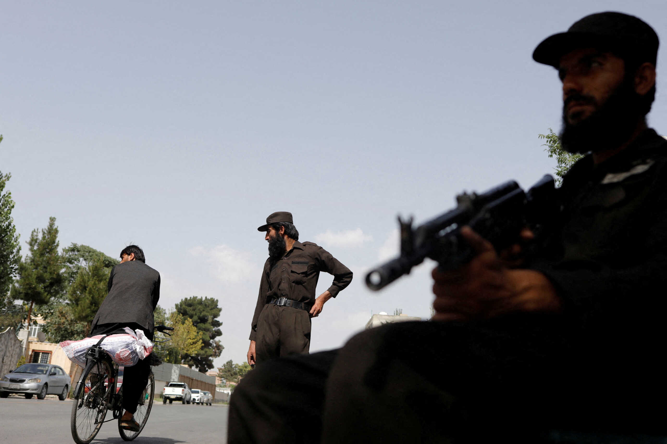 Taliban soldiers stand guard at a checkpoint in Kabul, Afghanistan, July 6, 2023. REUTERS