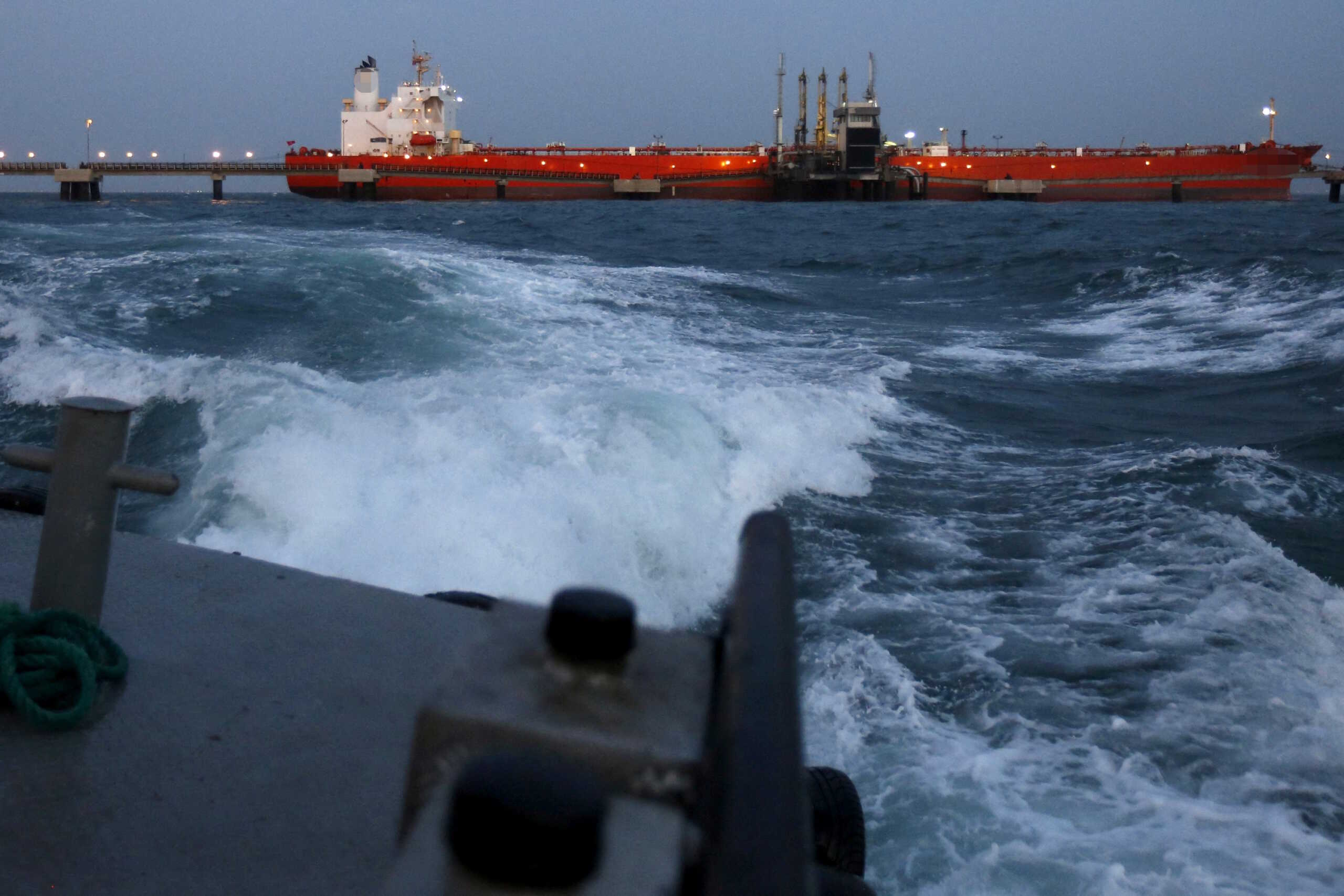 FILE PHOTO: An oil tanker is docked while oil is pumped into it at the ships terminal of PDVSA's Jose Antonio Anzoategui industrial complex in the state of Anzoategui April 15, 2015. REUTERS