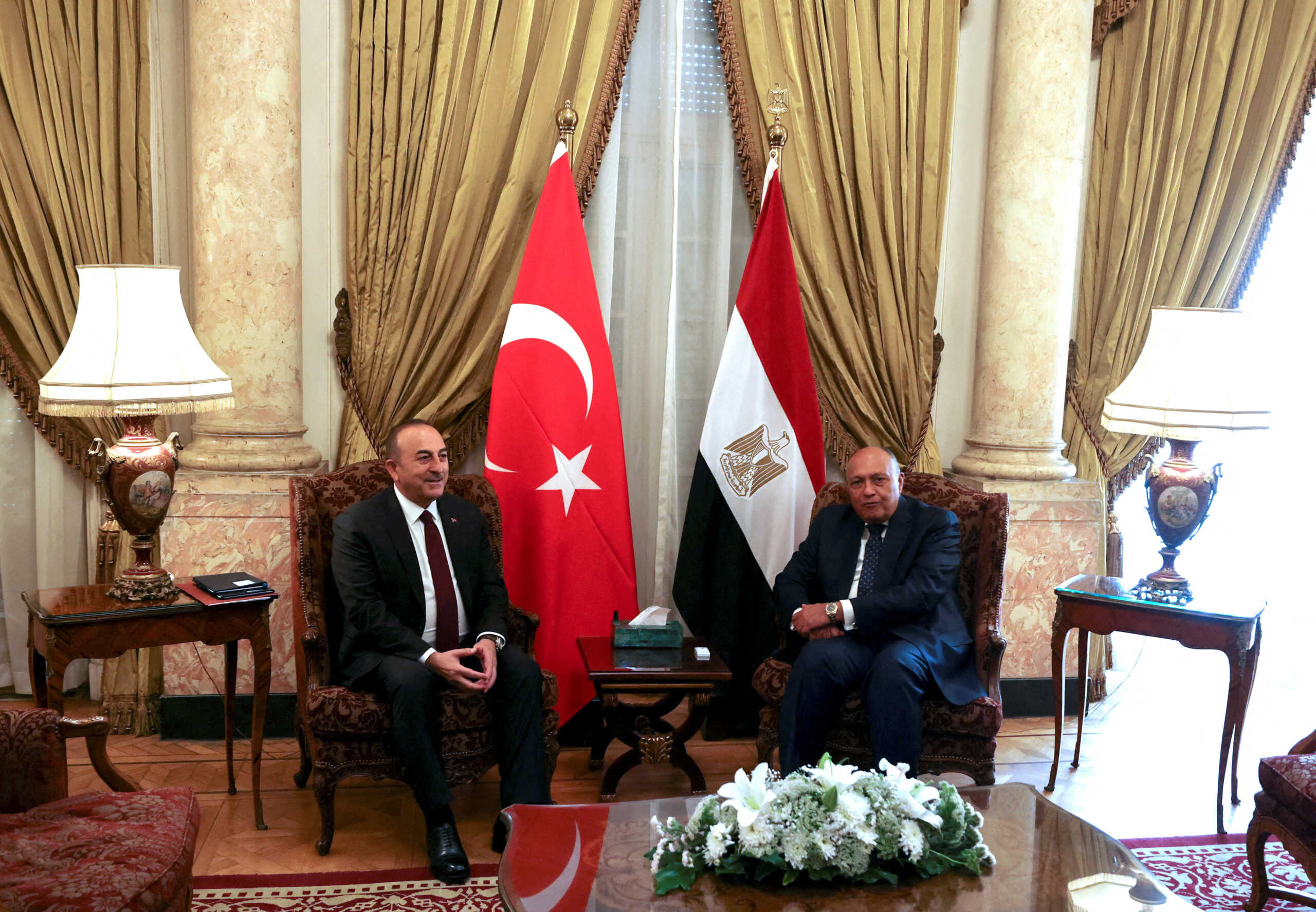 FILE PHOTO: Turkish Foreign Minister Mevlut Cavusoglu meets with his Egyptian counterpart Sameh Shoukry in Cairo, Egypt March 18, 2023. REUTERS