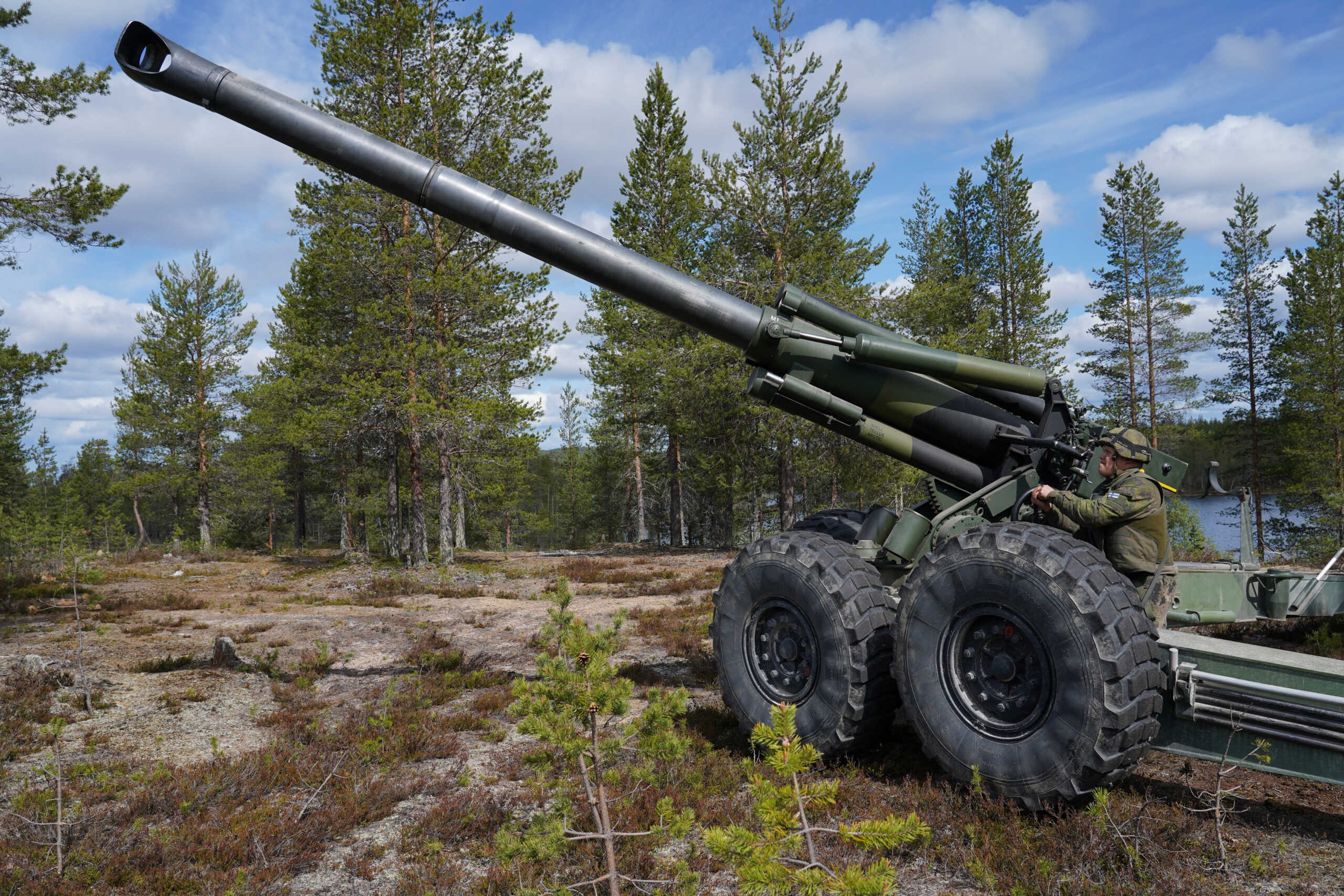 A Finnish soldier operates a towed 155 mm field gun during Northern Forest land force exercise in Rovajarvi, Finland May 30, 2023. REUTERS