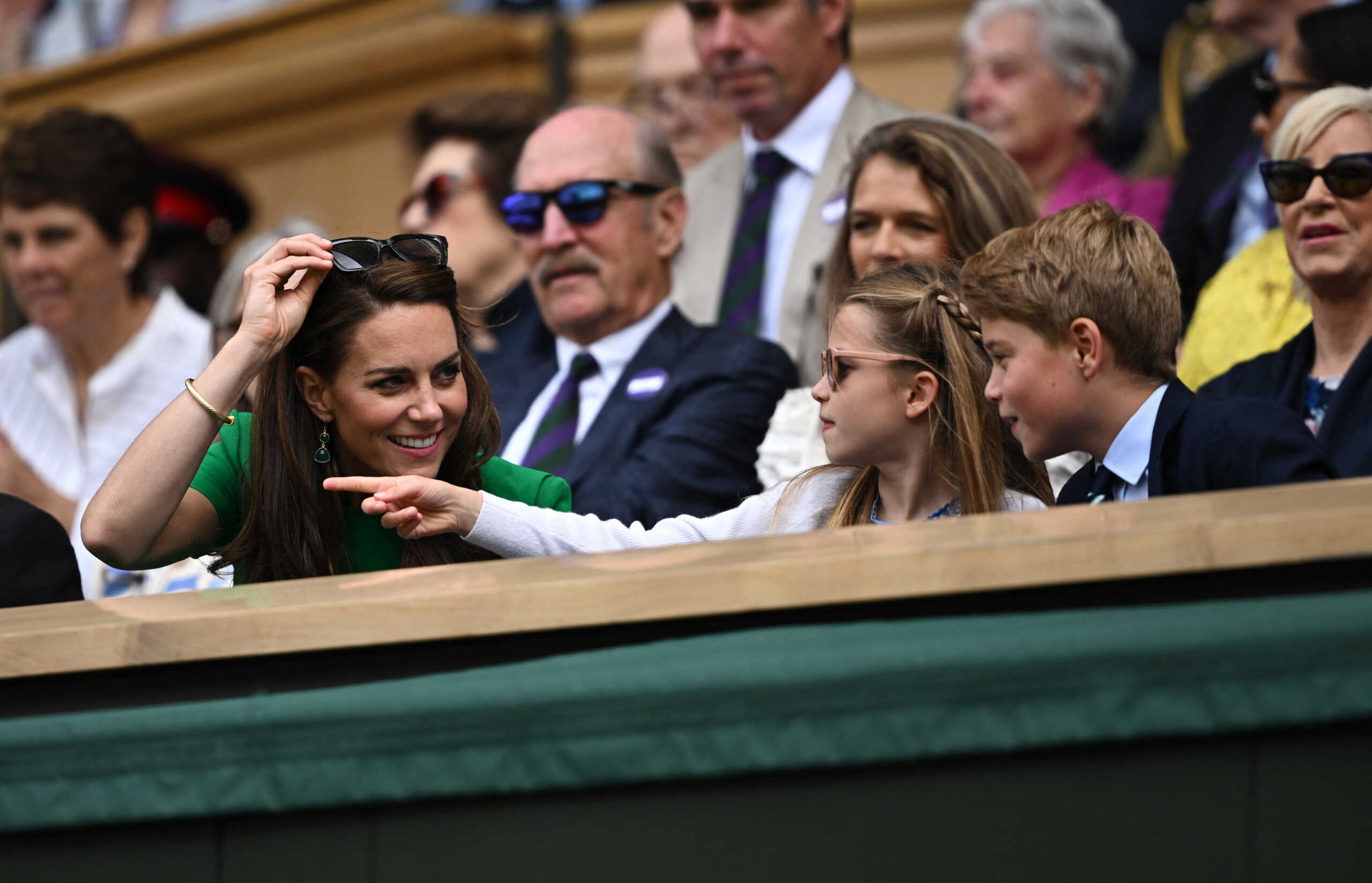 Tennis - Wimbledon - All England Lawn Tennis and Croquet Club, London, Britain - July 16, 2023 Britain's Catherine, Princess of Wales, Princess Charlotte and Prince George in the royal box during the men's singles final REUTERS