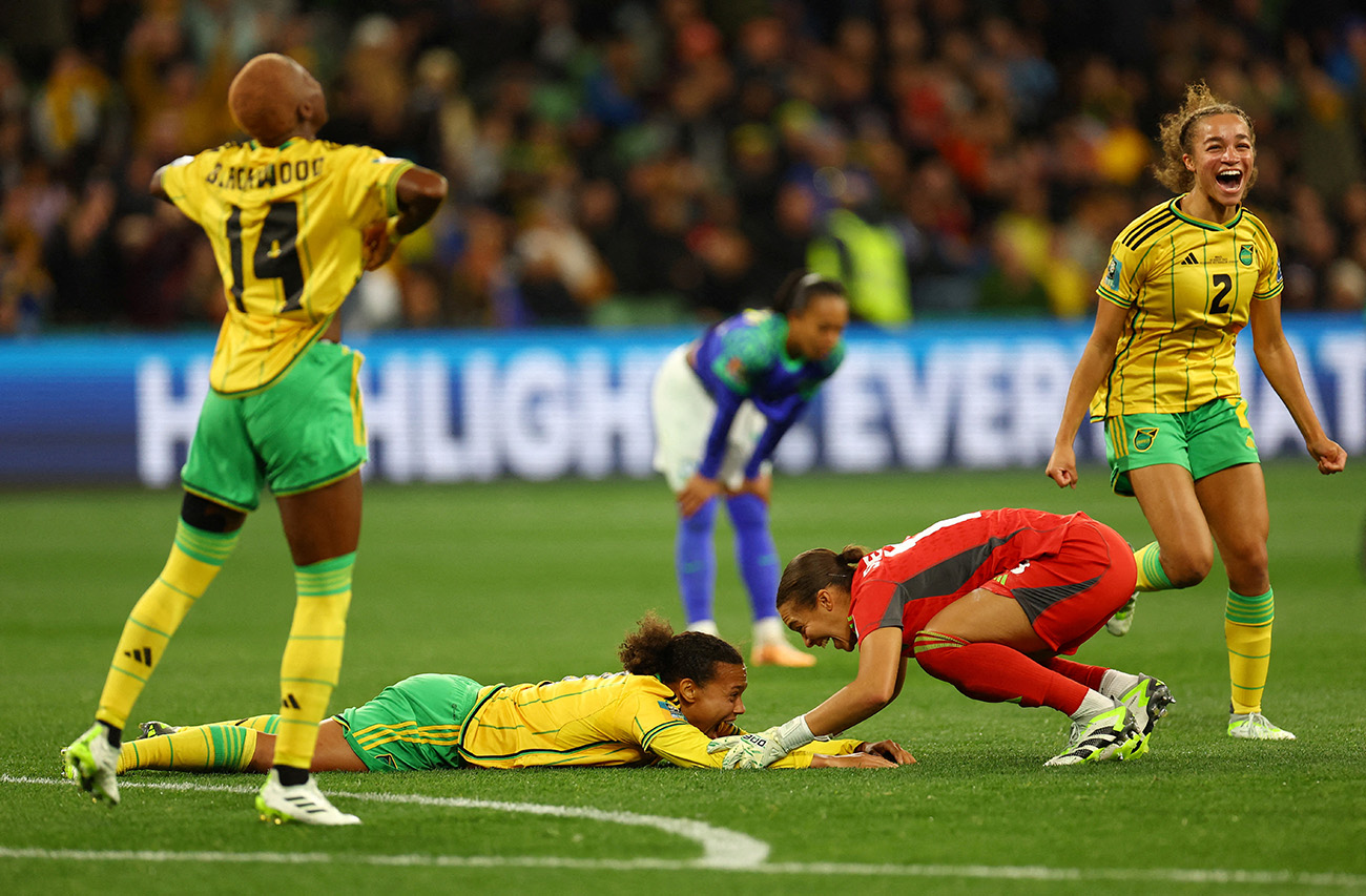 Soccer Football - FIFA Women’s World Cup Australia and New Zealand 2023 - Group F - Jamaica v Brazil - Melbourne Rectangular Stadium, Melbourne, Australia - August 2, 2023
Jamaica's Solai Washington and Rebecca Spencer celebrate after the match as Jamaica qualify for the knockout stages of the World Cup REUTERS