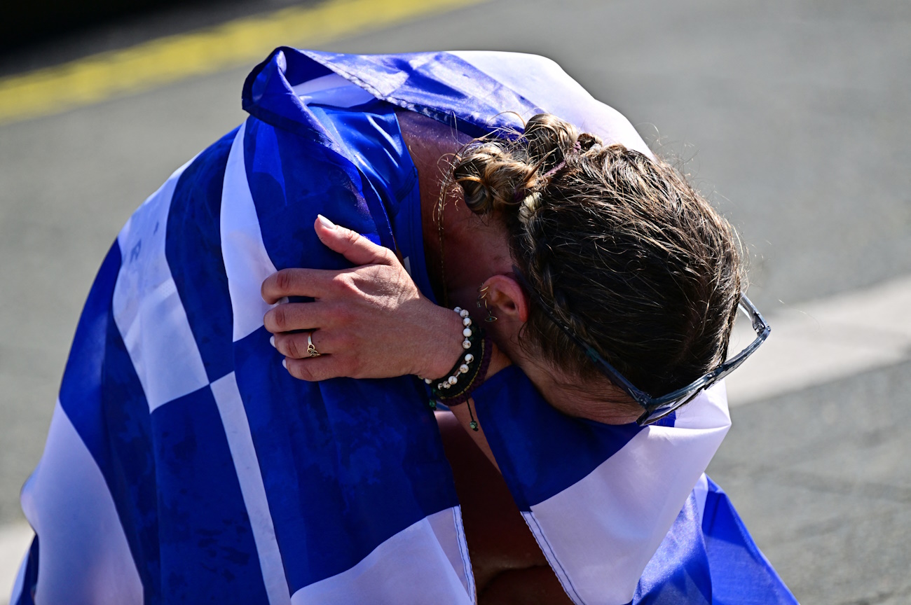 Athletics - World Athletics Championship - Women's 35 km Race Walk - Budapest, Hungary - August 24, 2023 Greece's Antigoni Ntrismpioti celebrates after winning the bronze medal in women's 35 km race walk REUTERS