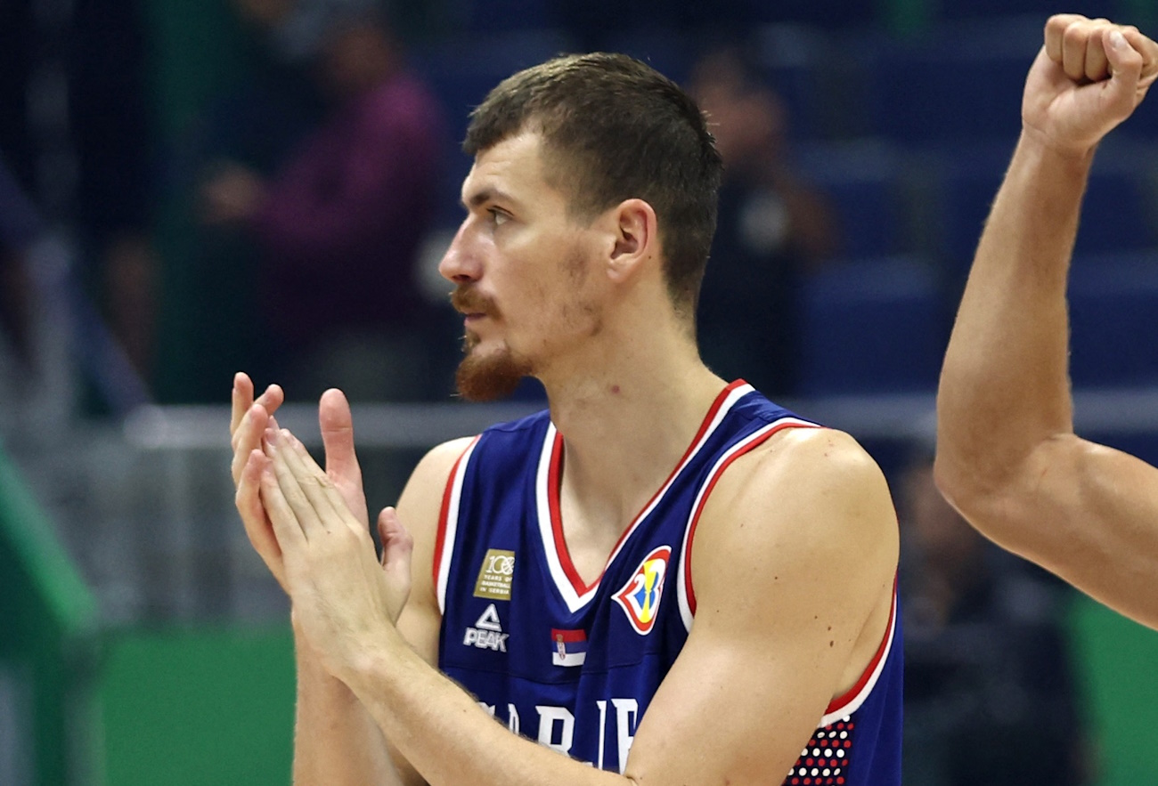 Basketball - FIBA World Cup 2023 - First Round - Group B - Puerto Rico v Serbia - Araneta Coliseum, Quezon, Philippines - August 28, 2023 Serbia's Borisa Simanic celebrates with Serbia's Bogdan Bogdanovic after winning the match REUTERS