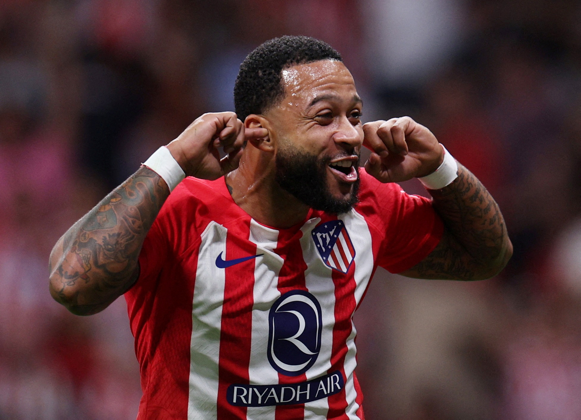 Soccer Football - Spain - LaLiga - Atletico Madrid v Granada - Metropolitano, Madrid, Spain - August 14, 2023 Atletico Madrid's Memphis Depay celebrates scoring their second goal REUTERS
