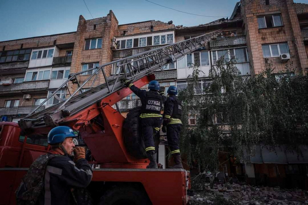 Rescuers work at the site where a building was destroyed during a Russian missile strike, amid Russia's attack on Ukraine, in Pokrovsk, Donetsk region, Ukraine August 7, 2023. Press service of the State Emergency Service of Ukraine