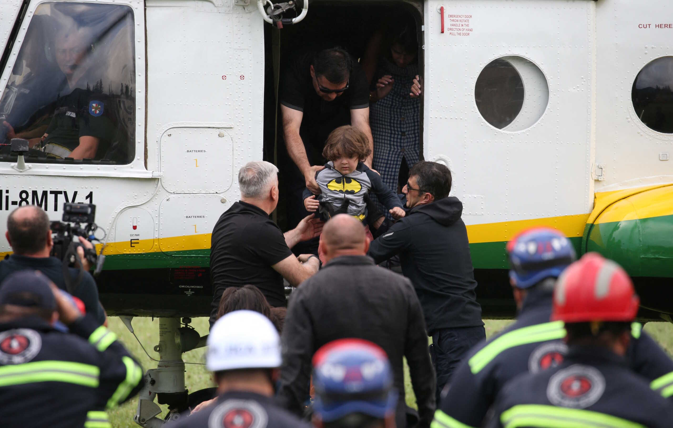 Rescuers evacuate people by helicopter from the area affected by a landslide in the Racha Region, Georgia August 4, 2023. REUTERS