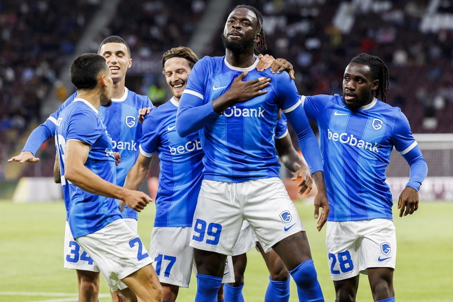 epa10768308 Genk's forward Toluwalase Arokodare, 2nd right, celebrates with teammates after scoring the 1-0 lead during the UEFA Champions League Second qualifying round first leg soccer match between Servette FC and KRC Genk, at the Stade de Geneve stadium, in Geneva, Switzerland, 25 July 2023.  EPA