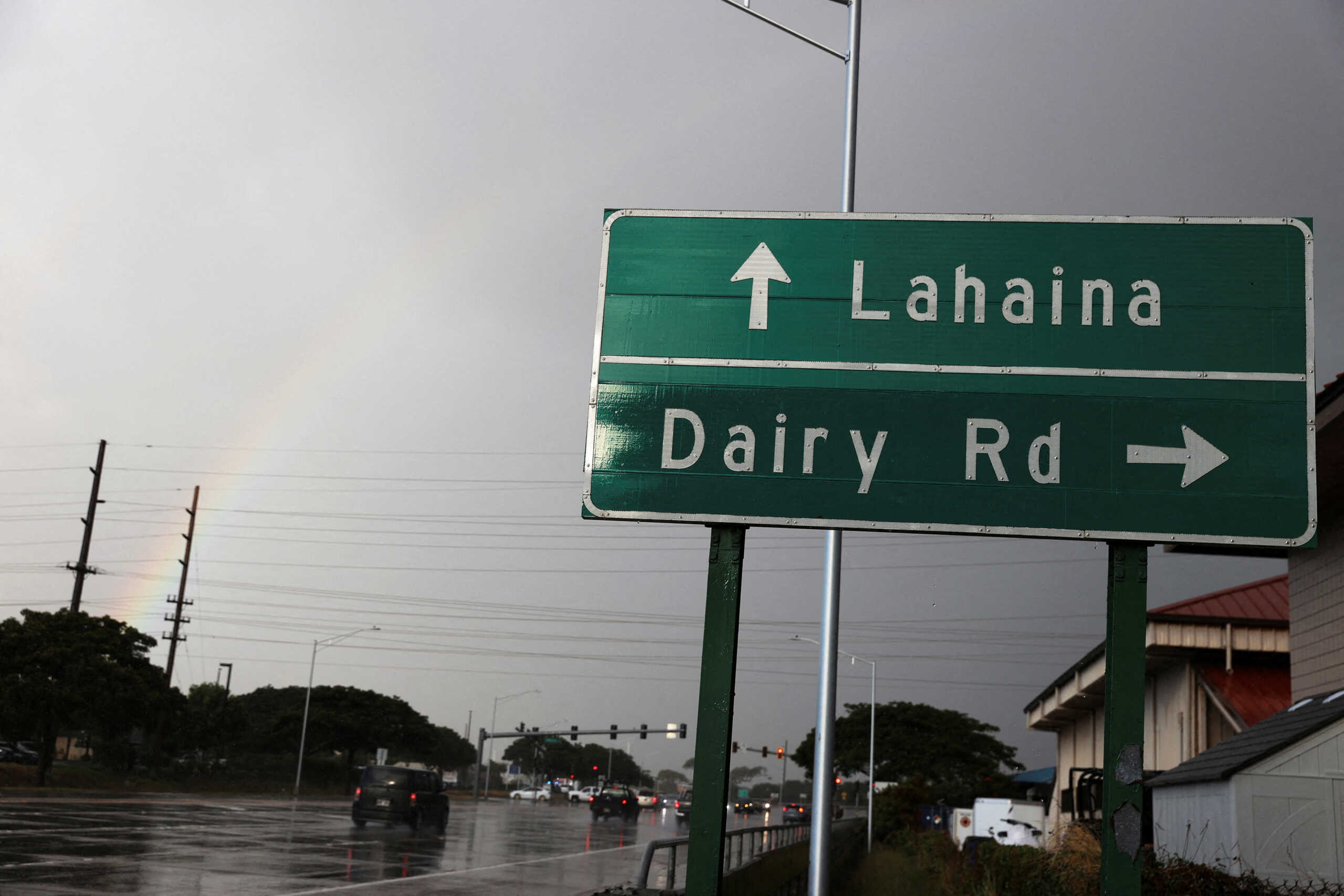 A rainbow can be seen as rain falls over Maui in Kahului, as wildfires driven by high winds hit the Hawaiian island, in Hawaii, U.S. August 10, 2023. REUTERS