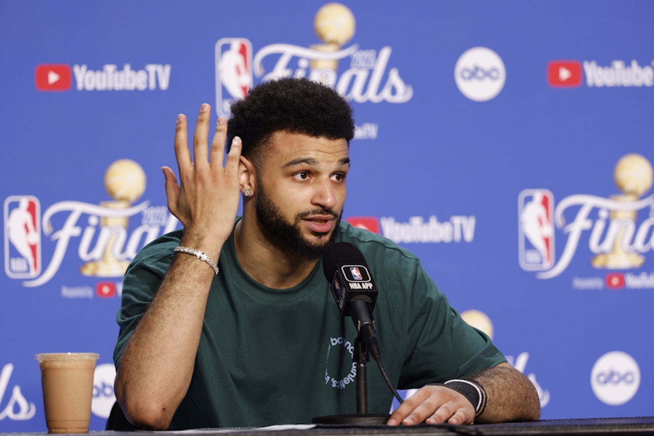 epa10682761 Denver Nuggets guard Jamal Murray responds to a question during a press conference after game four of the NBA Finals between the Denver Nuggets and Miami Heat at Kaseya Center in Miami, Florida, USA, 09 June 2023.  EPA