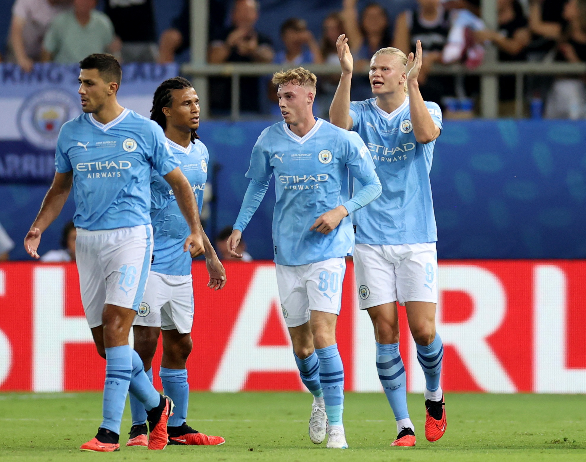 Soccer Football - UEFA Super Cup - Manchester City v Sevilla - Georgios Karaiskakis Stadium, Athens, Greece - August 16, 2023 Manchester City's Cole Palmer celebrates scoring their first goal with teammates REUTERS