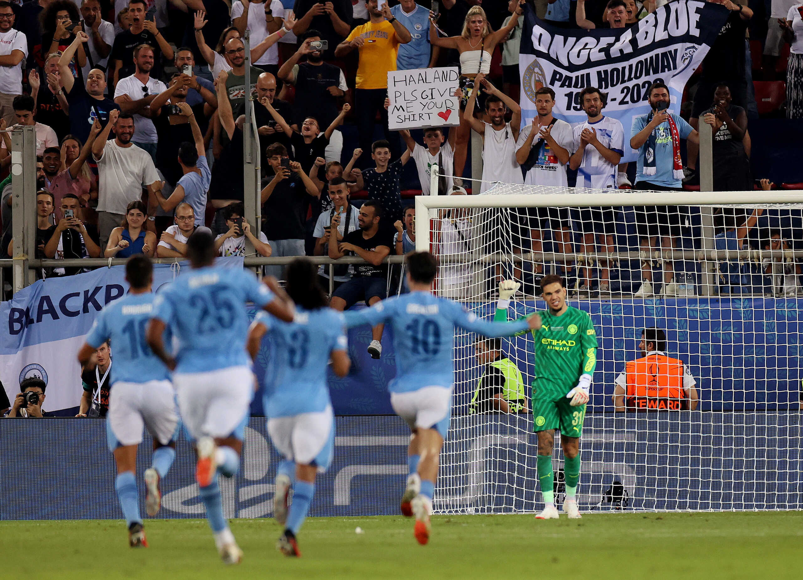 Soccer Football - UEFA Super Cup - Manchester City v Sevilla - Georgios Karaiskakis Stadium, Athens, Greece - August 16, 2023 Manchester City players celebrate after winning the penalty shootout REUTERS