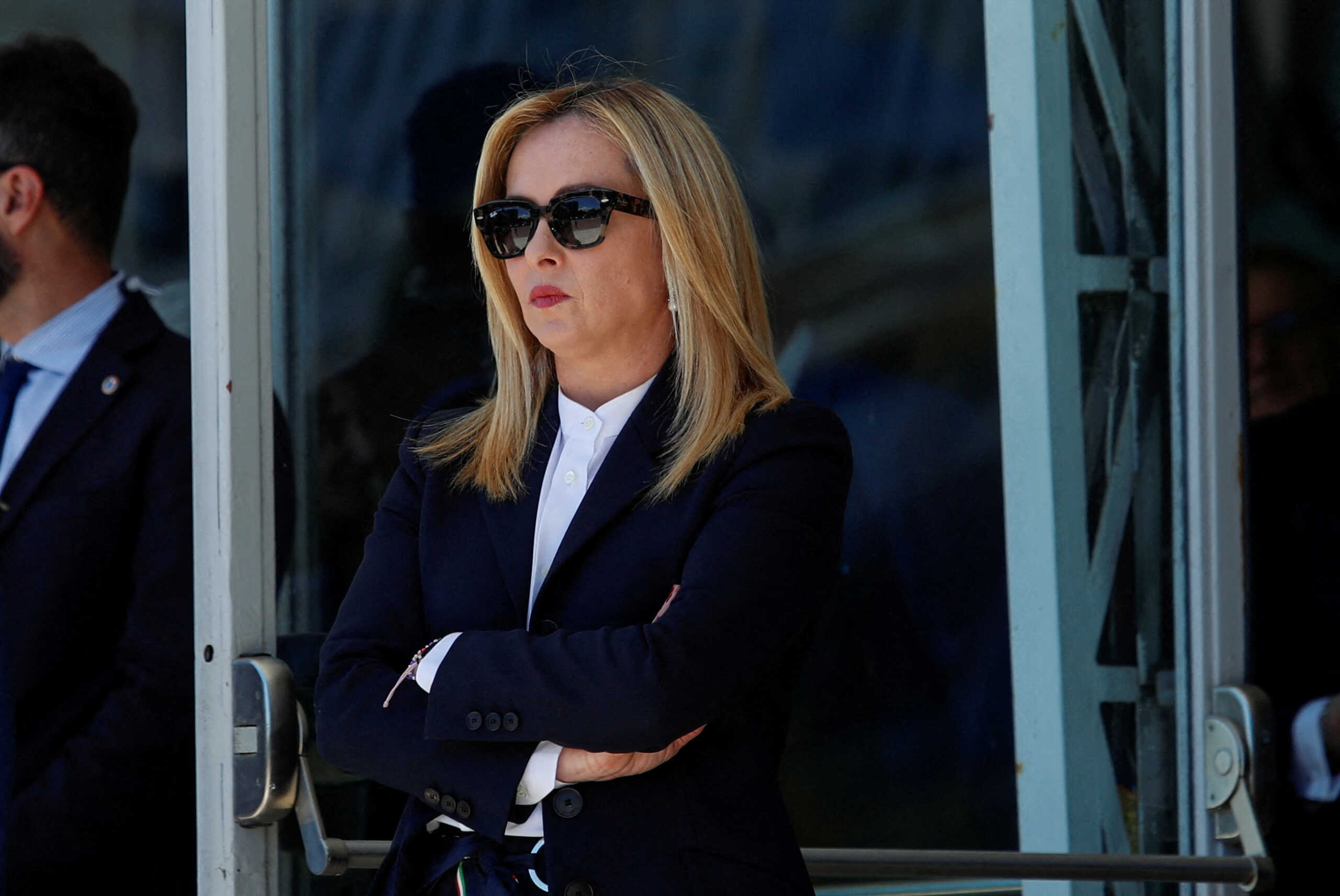 FILE PHOTO: Italian Prime Minister Giorgia Meloni waits to welcome Ukrainian Prime Minister Denys Shmyhal before a reconstruction meeting for war-battered Ukraine, in Rome, Italy, April 26, 2023. REUTERS