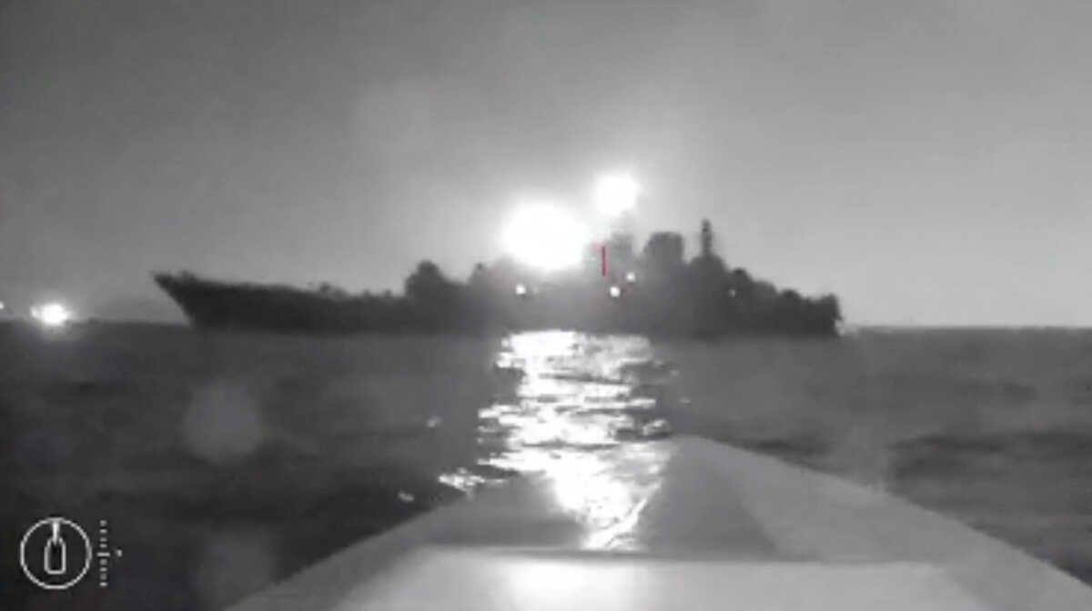 A sea drone shows the silhouette of Olenegorsky Gornyak ship near the port of Novorossiysk, Russia, in this screengrab obtained from social media video released on August 4, 2023. Video obtained by Reuters