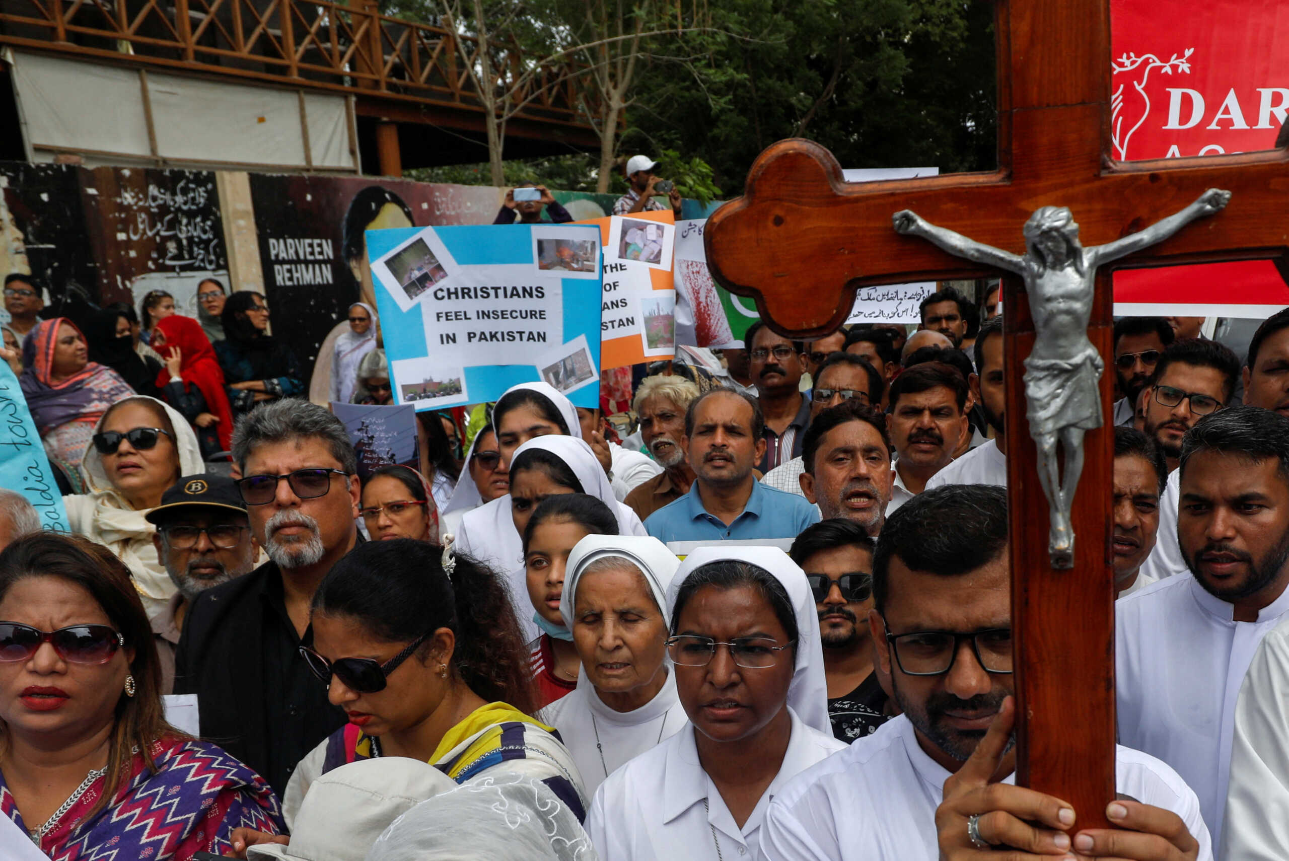 Members of the Christian community chant slogans as they gather to condemn the attacks on churches and houses in Jaranwala town of Faisalabad, during a protest in Karachi, Pakistan August 18, 2023. REUTERS