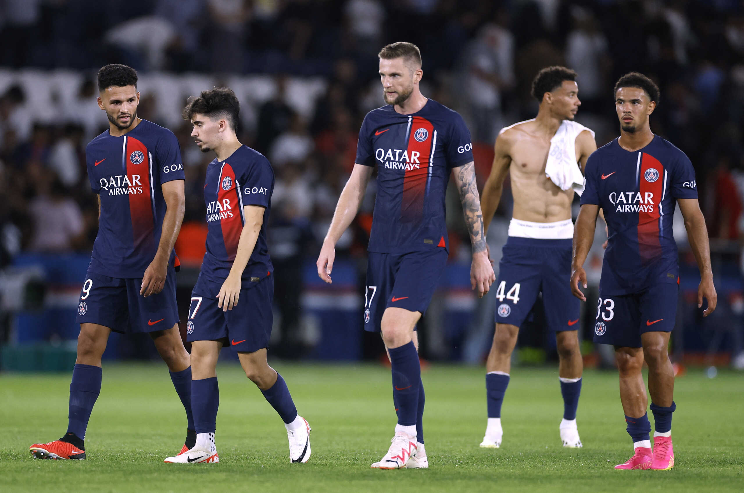 Soccer Football - Ligue 1 - Paris St Germain v Lorient - Parc des Princes, Paris, France - August 12, 2023  Paris St Germain's Milan Skriniar, Vitinha, Goncalo Ramos and Warren Zaire-Emery react after the match REUTERS